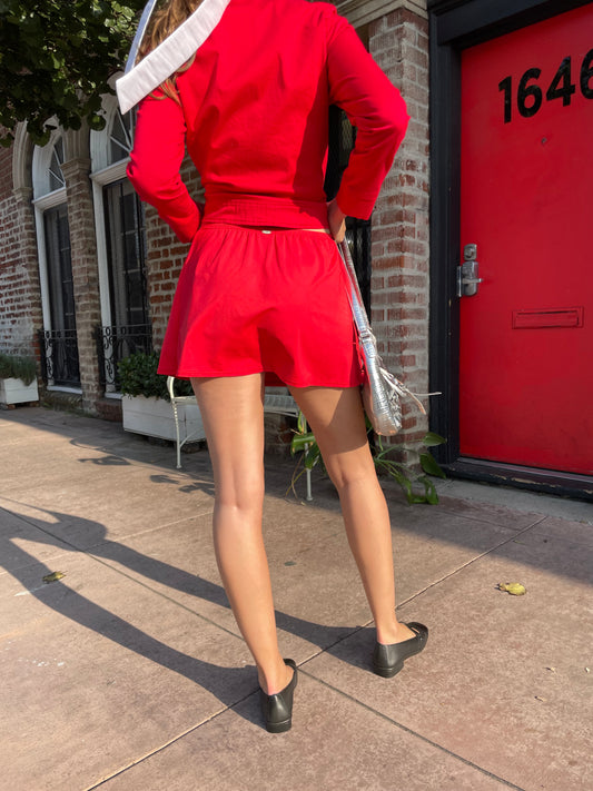 girl in red jacket and skirt