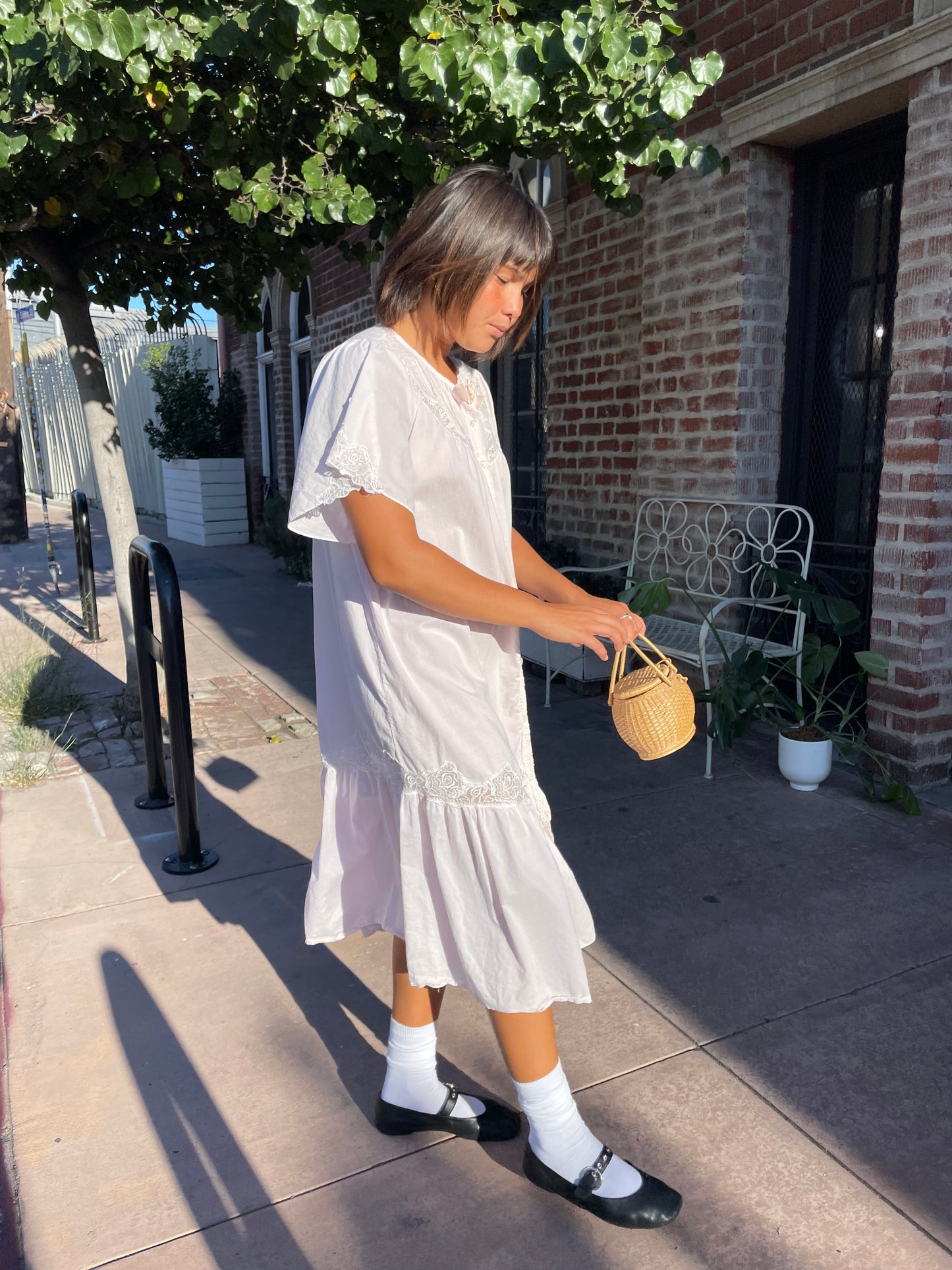 girl wearing a Powder Pink Rose Slip Dress