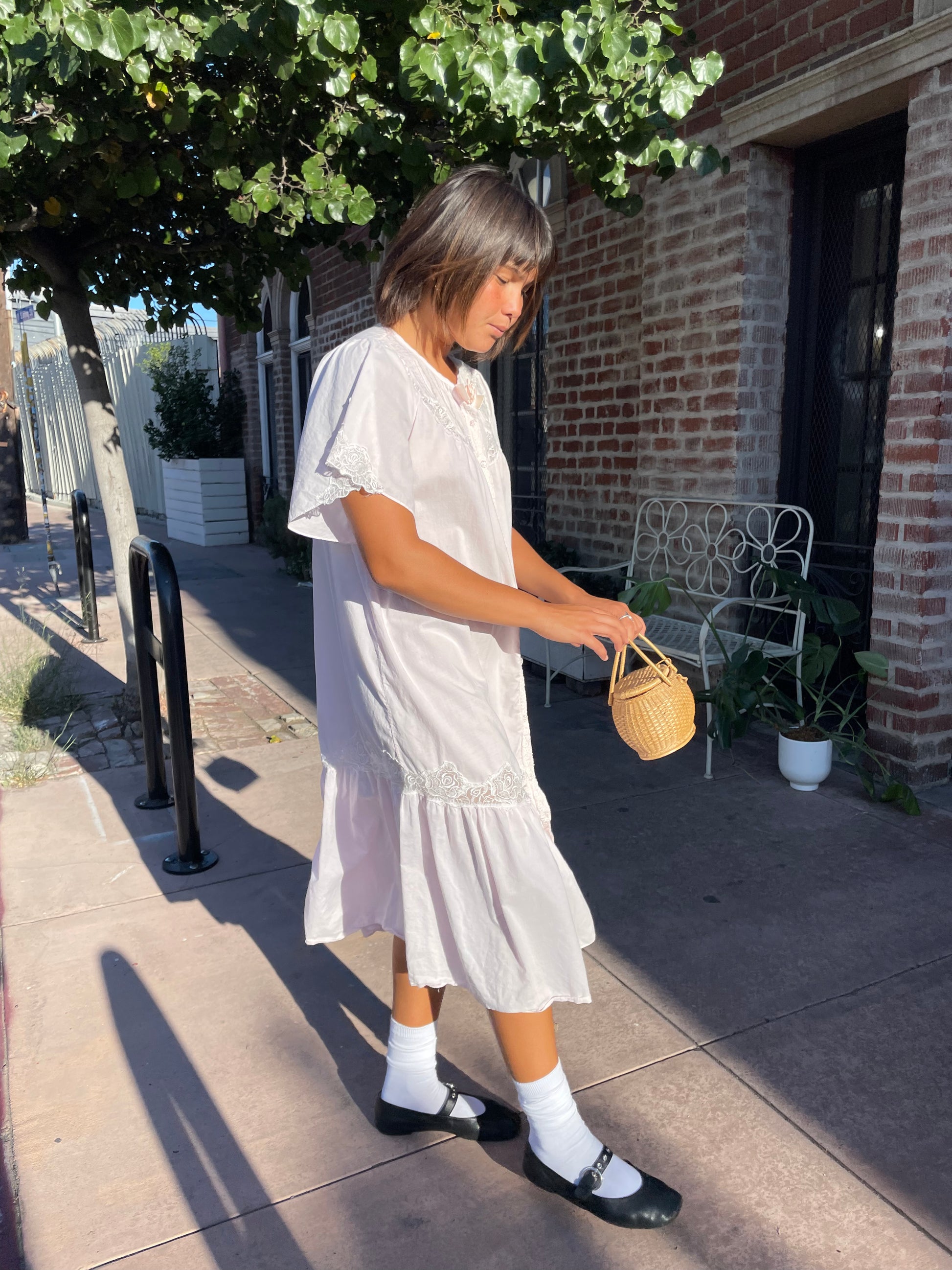 girl wearing a Powder Pink Rose Slip Dress