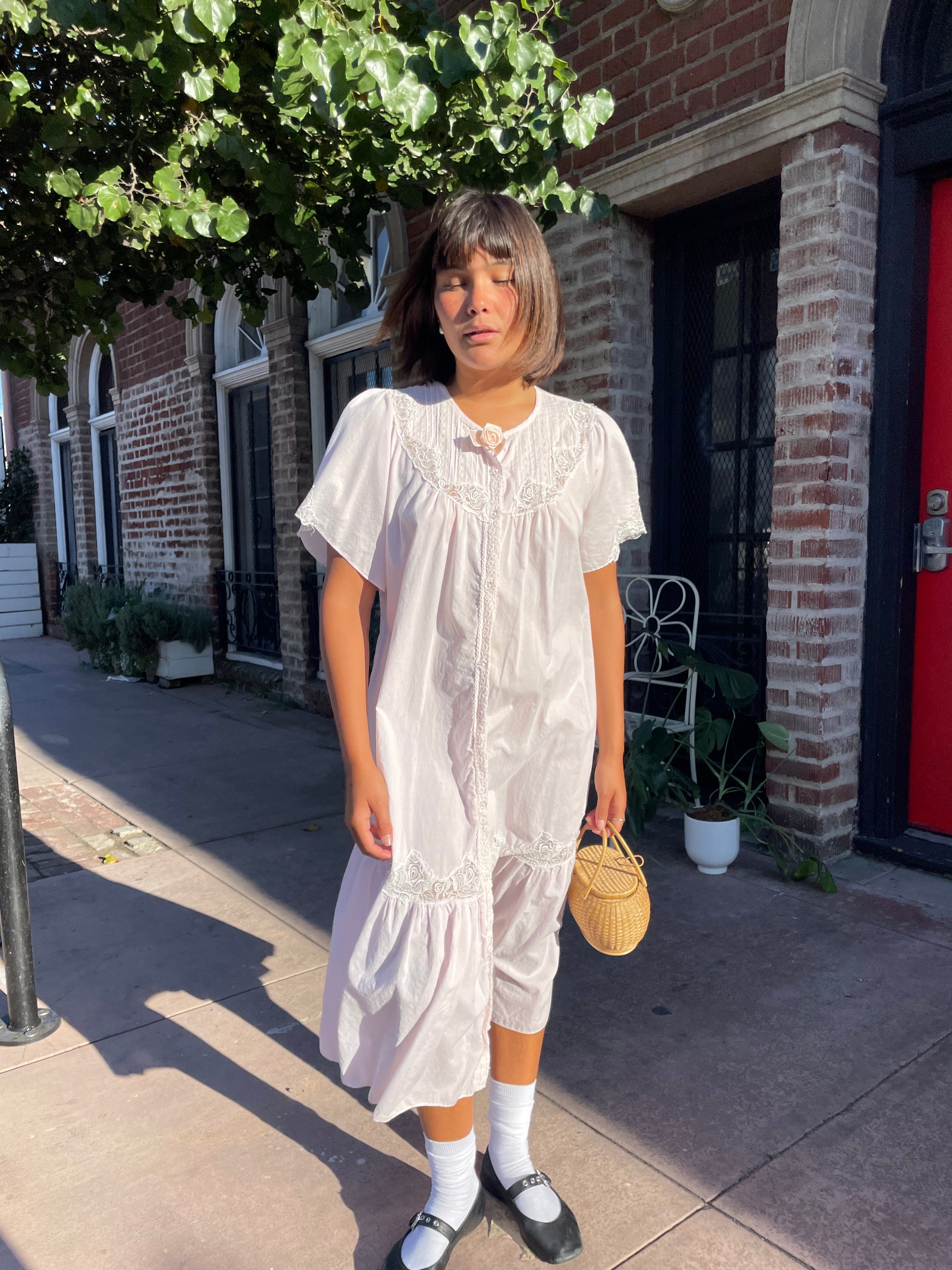 girl wearing a Powder Pink Rose Slip Dress