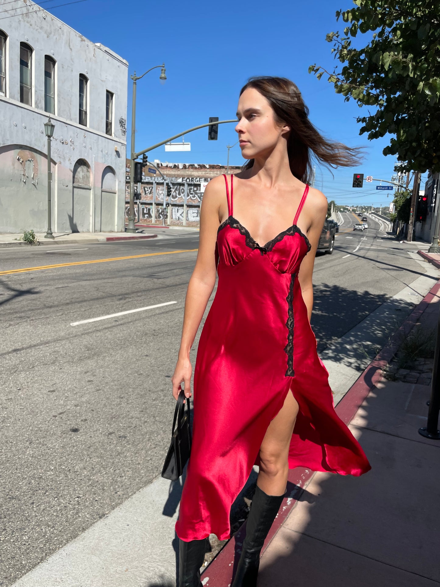 girl in red and black lace dress
