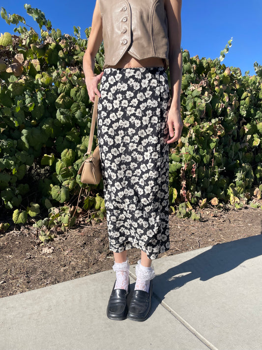girl in black floral skirt