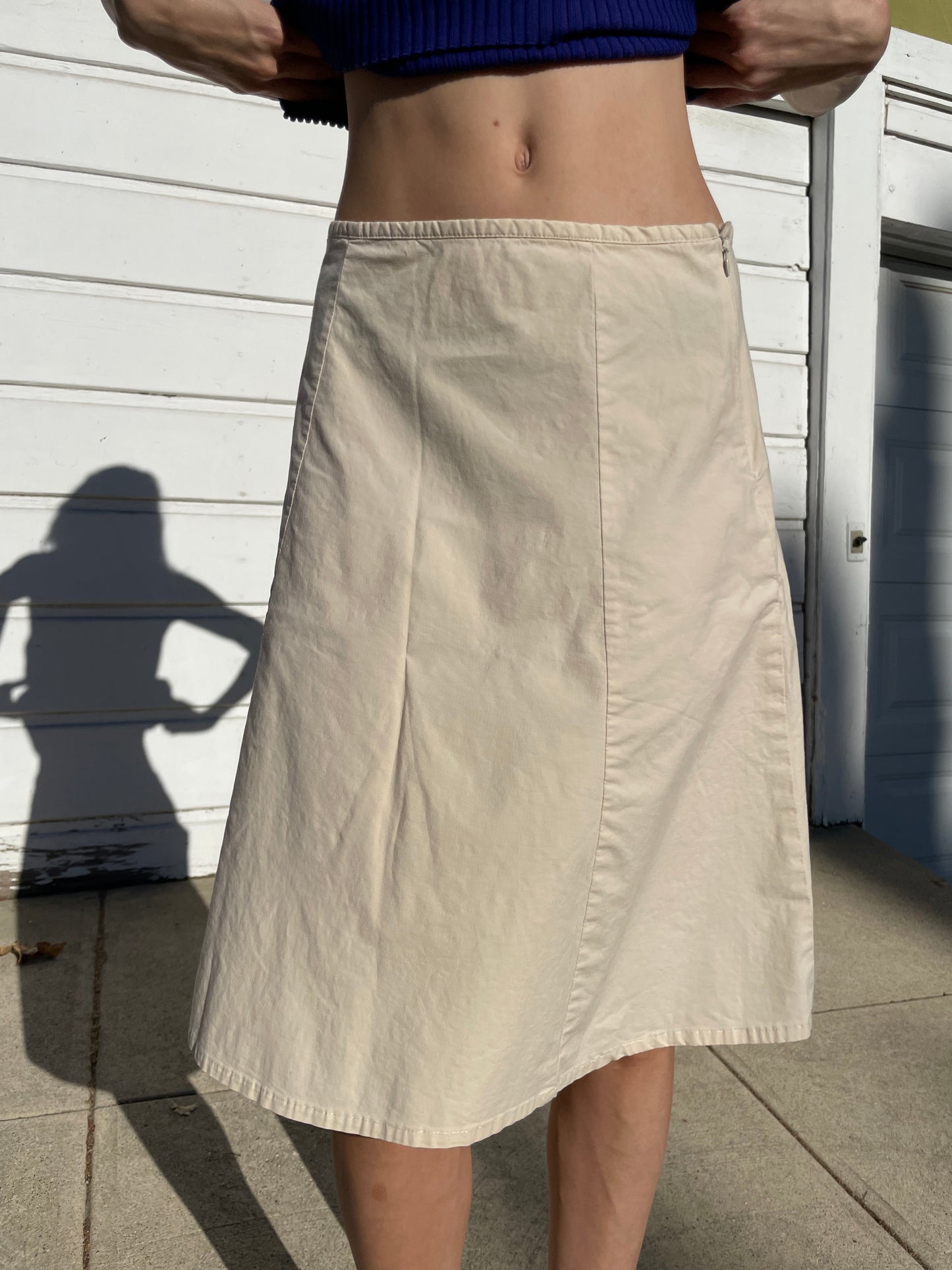 girl in cream knee skirt