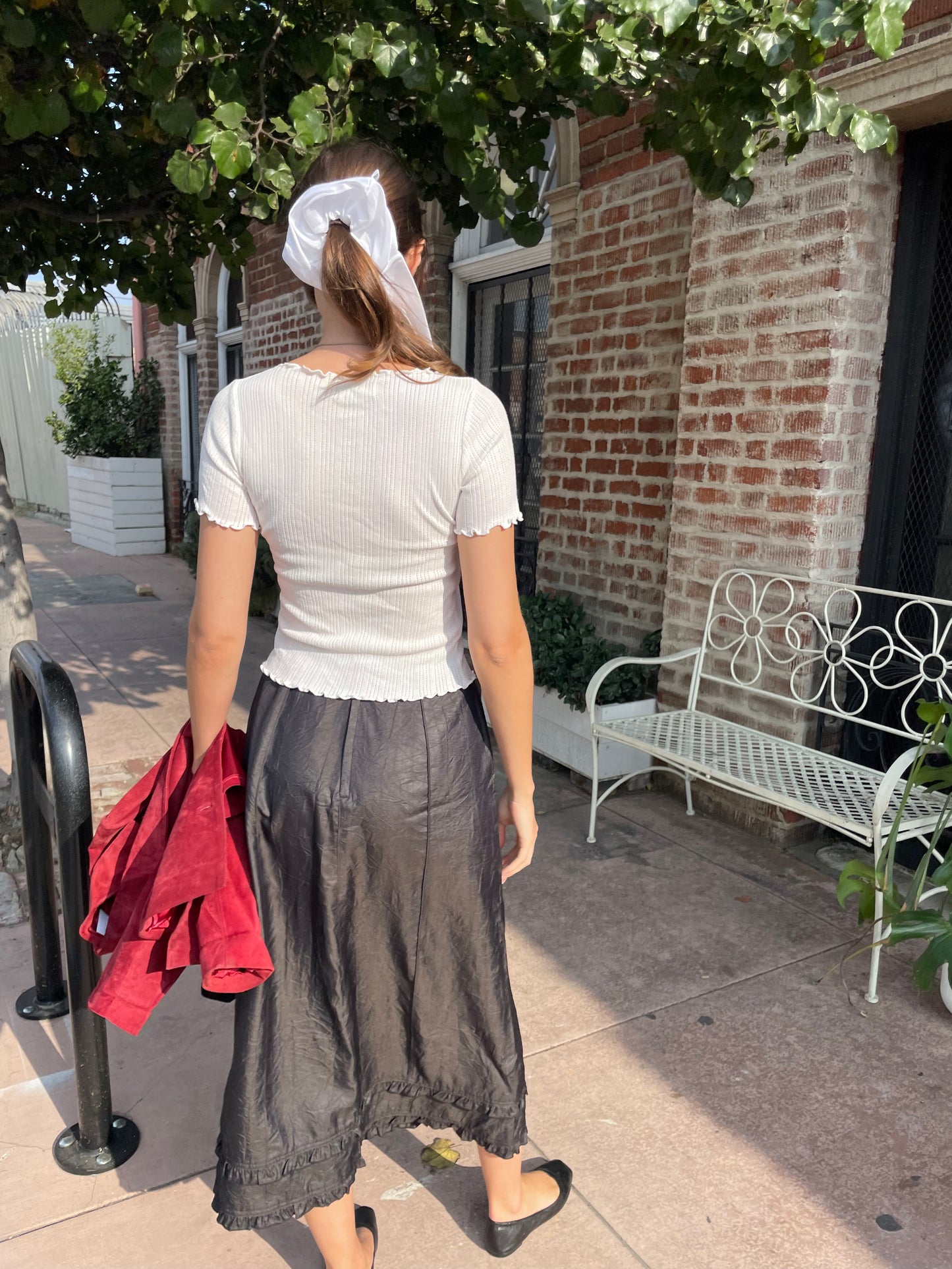 girl in white t-shirt and black skirt