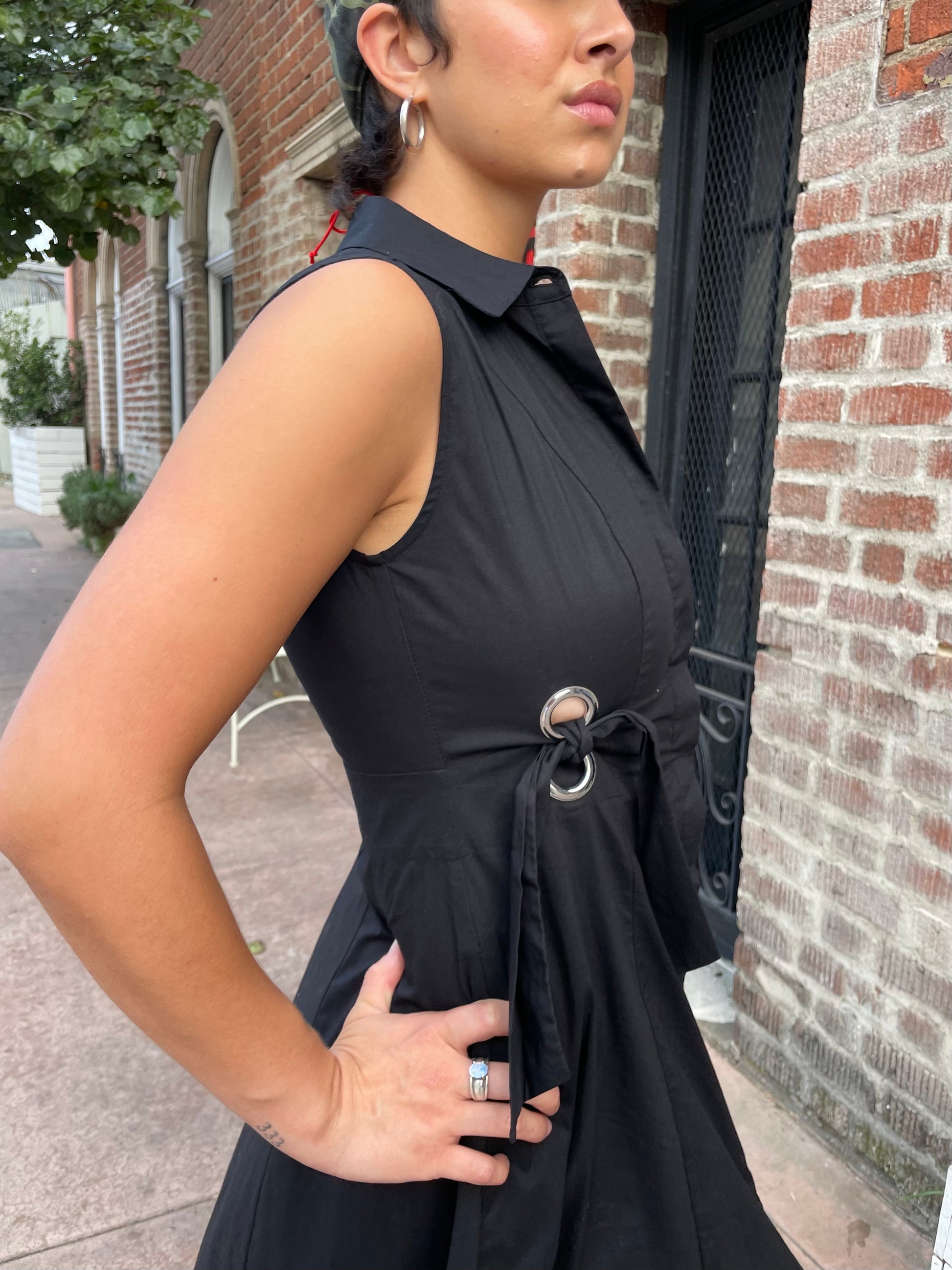 girl in black sleeveless dress