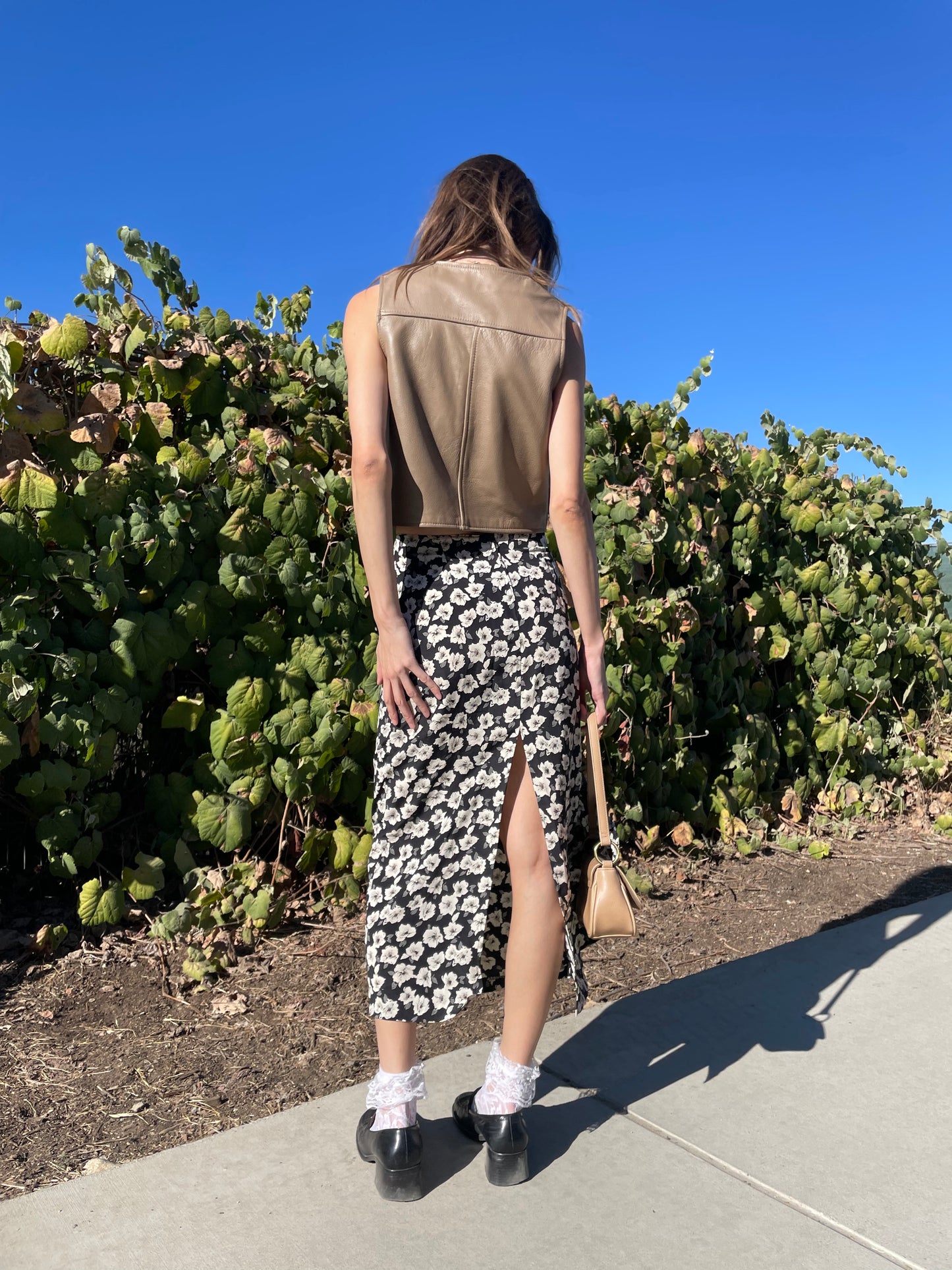 girl in black floral skirt