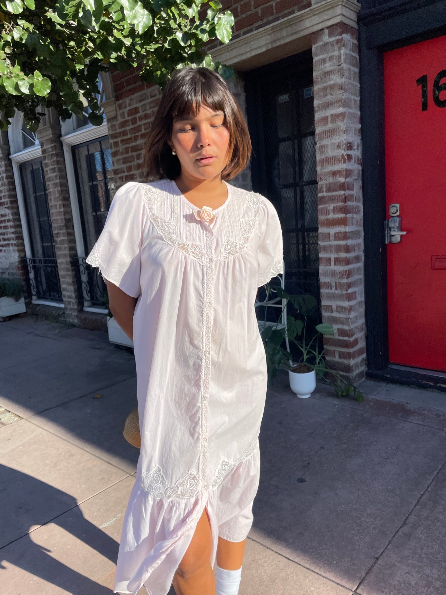 girl wearing a Powder Pink Rose Slip Dress