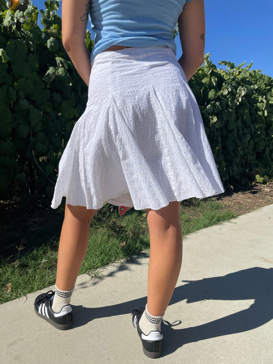 girl wearing white skirt