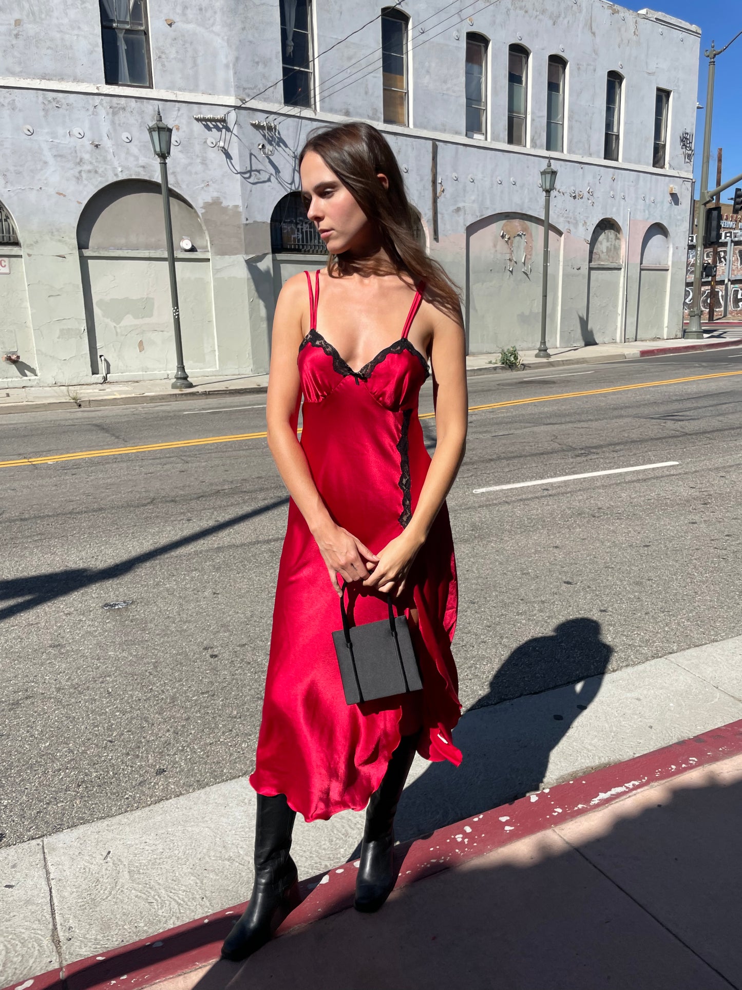 girl in red and black lace dress