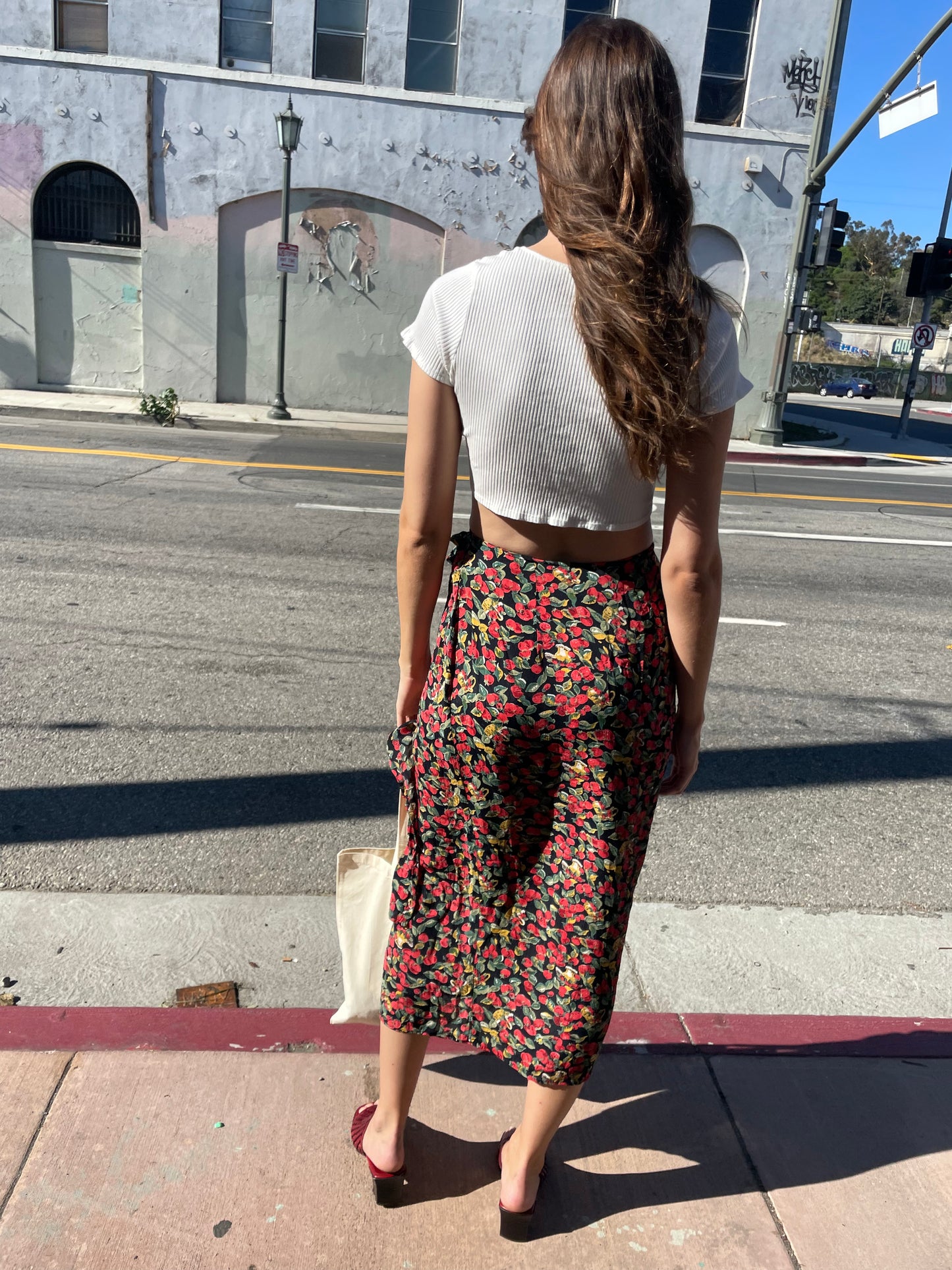 girl in cropped white top