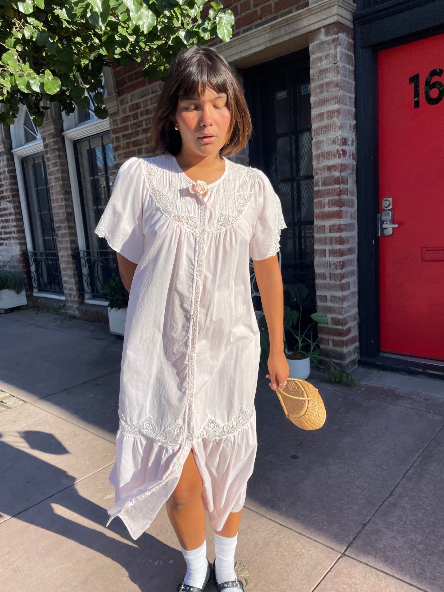 girl wearing a Powder Pink Rose Slip Dress