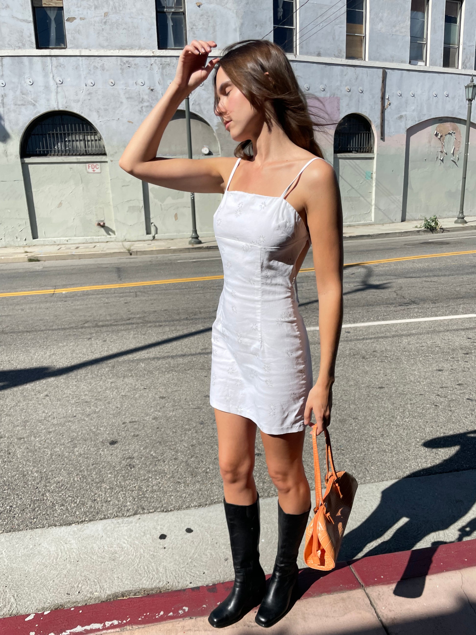 girl in white strappy dress