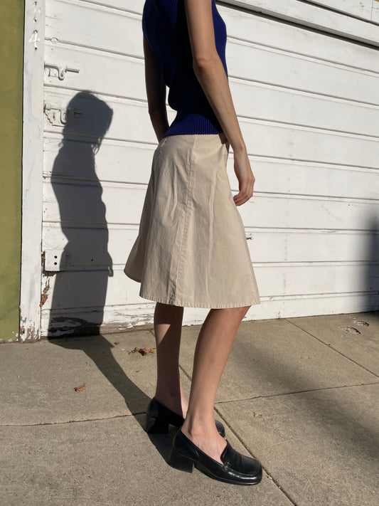 girl in cream knee skirt