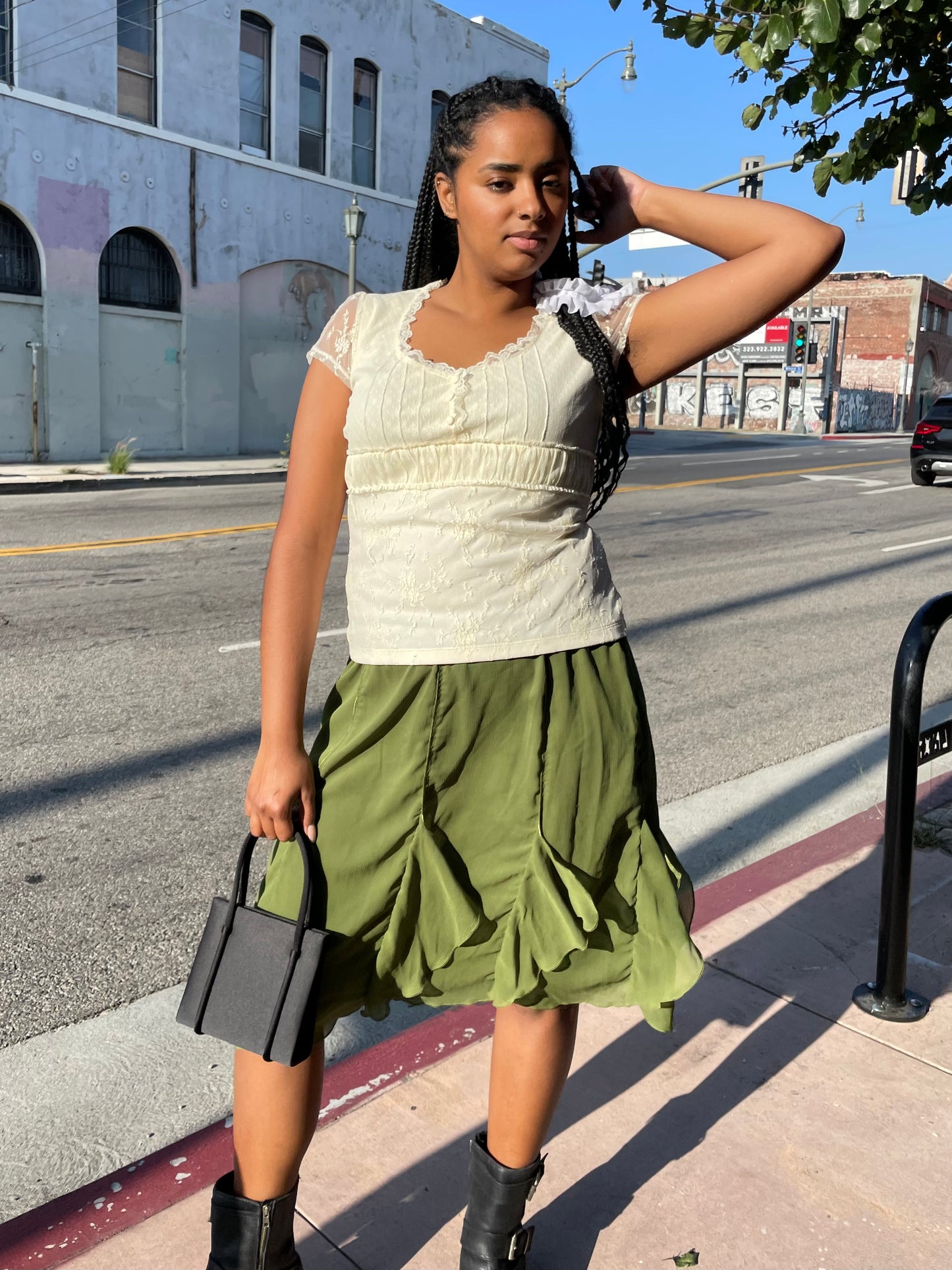 girl in green ruffle skirt