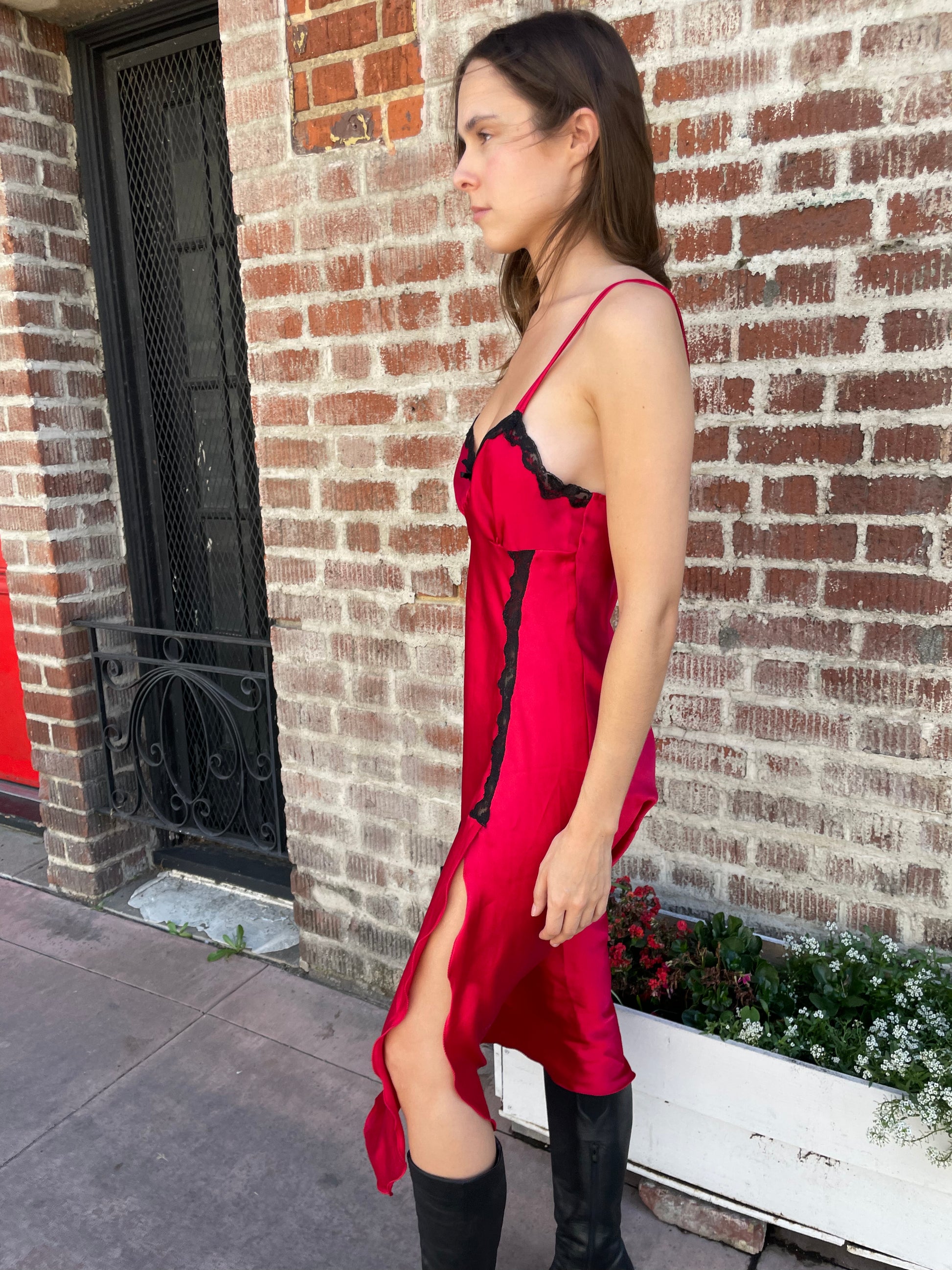 girl in red and black lace dress