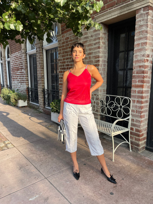 girl in red sporty mesh tank