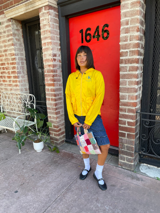 girl in yellow jacket