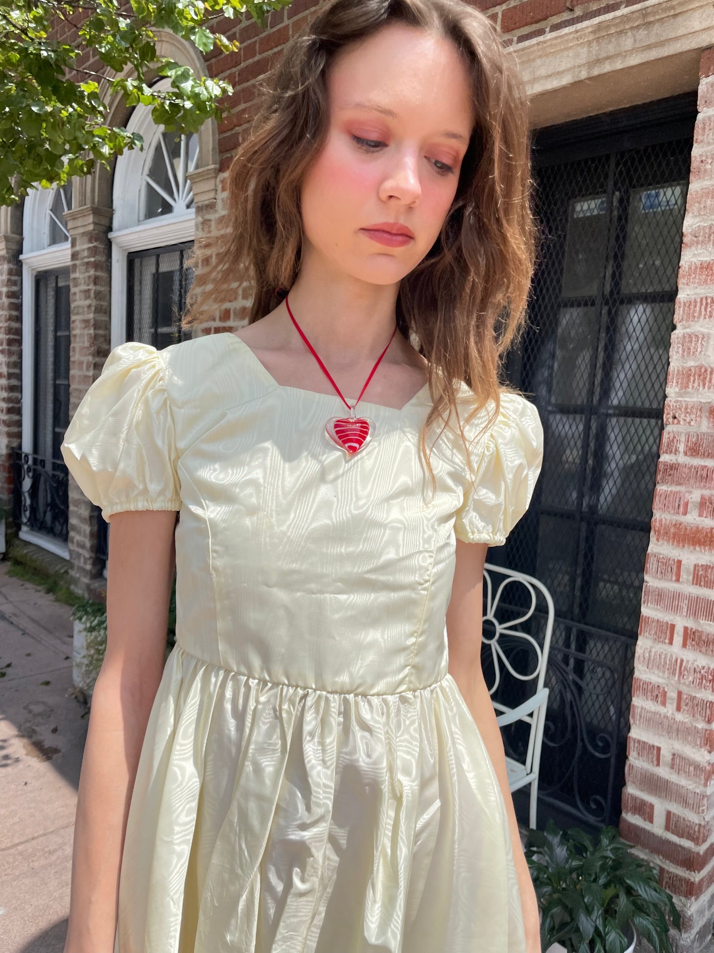girl wearing yellow short dress