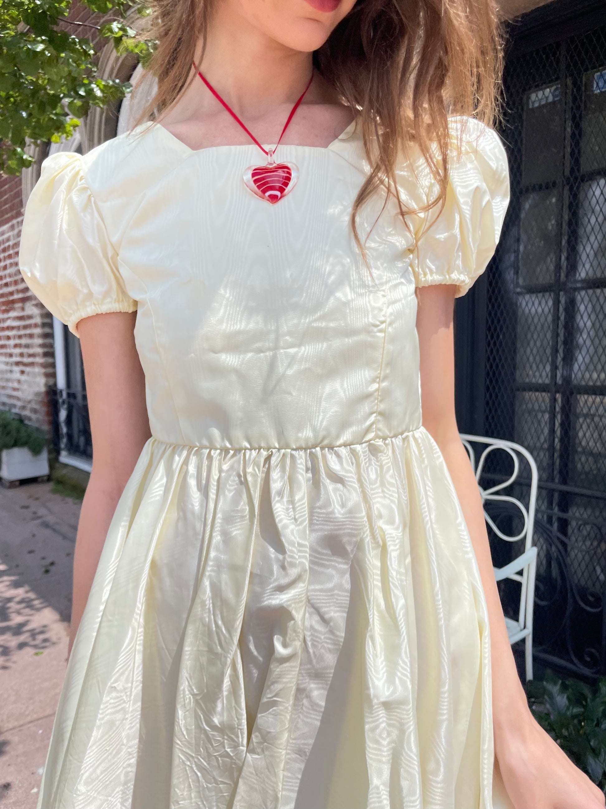 girl wearing yellow short dress