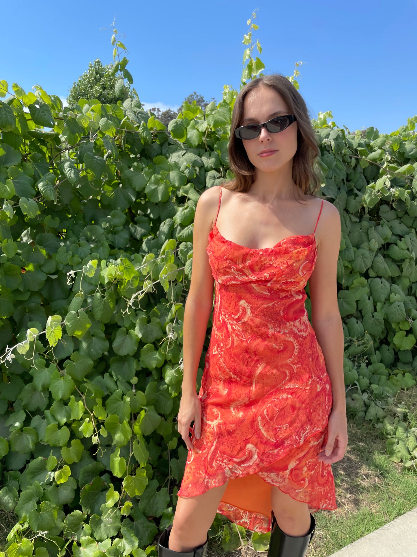 girl in orange printed dress