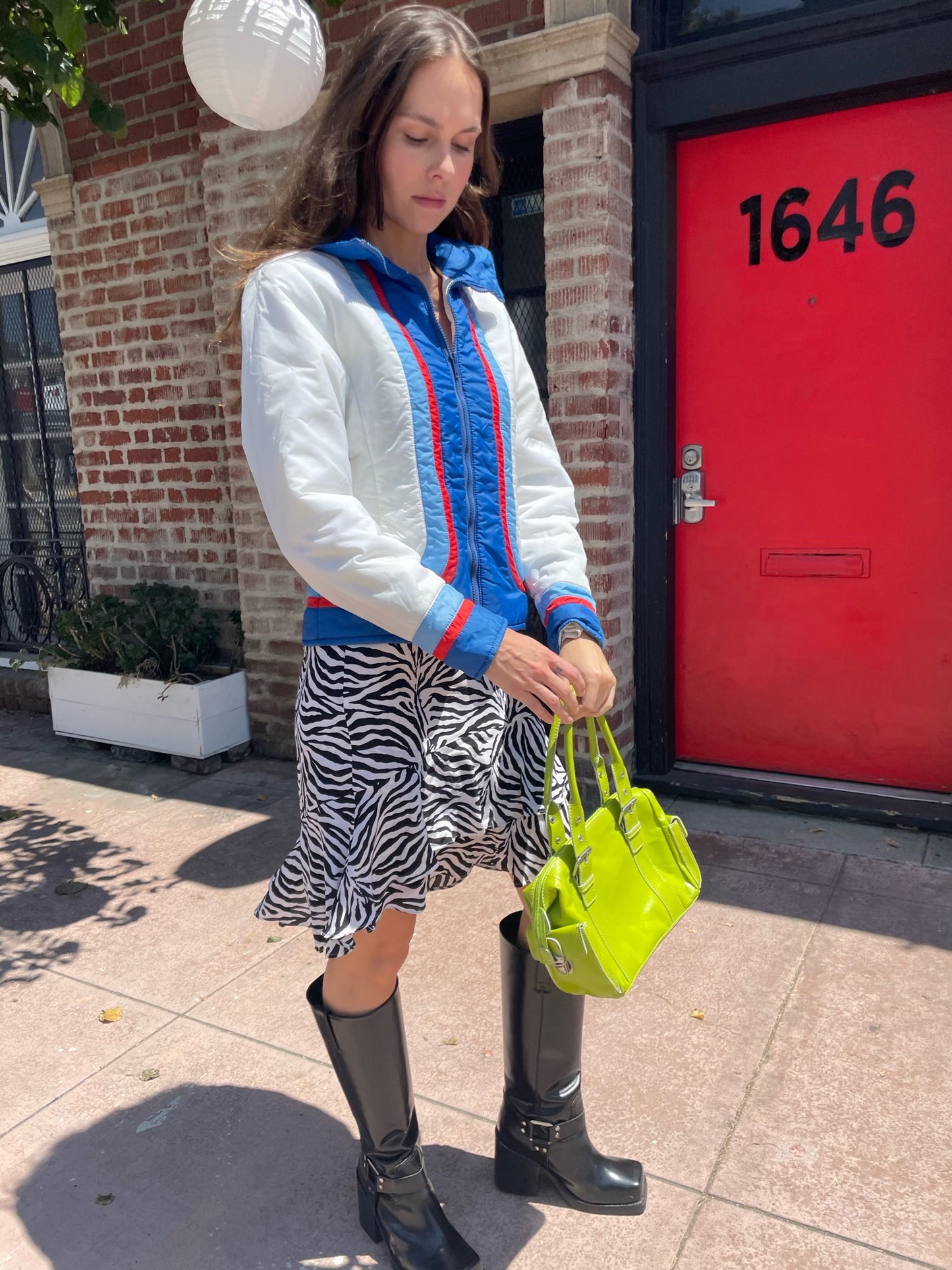 girl in zebra print skirt and sport jacket