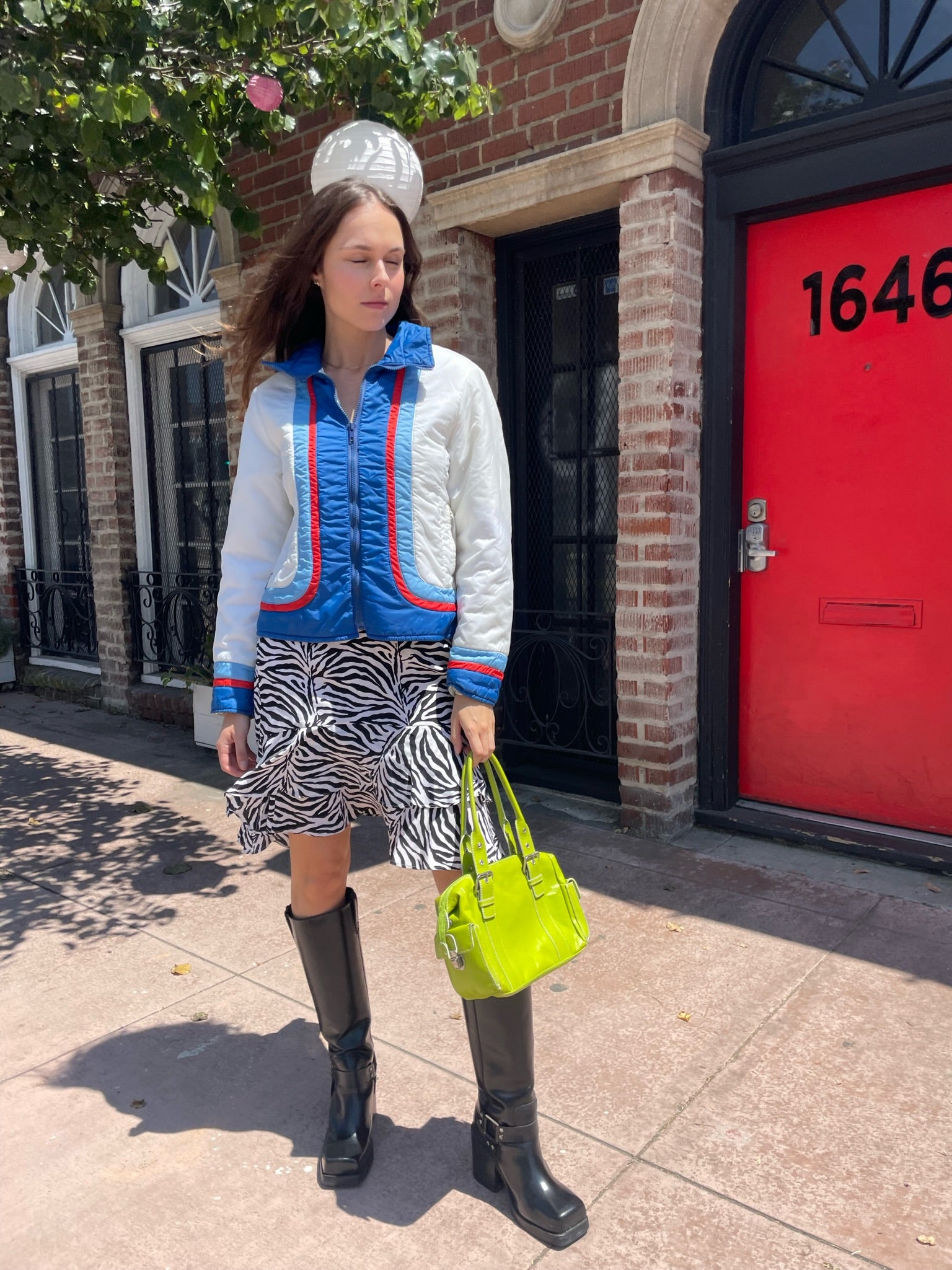 girl in zebra print skirt and sport jacket