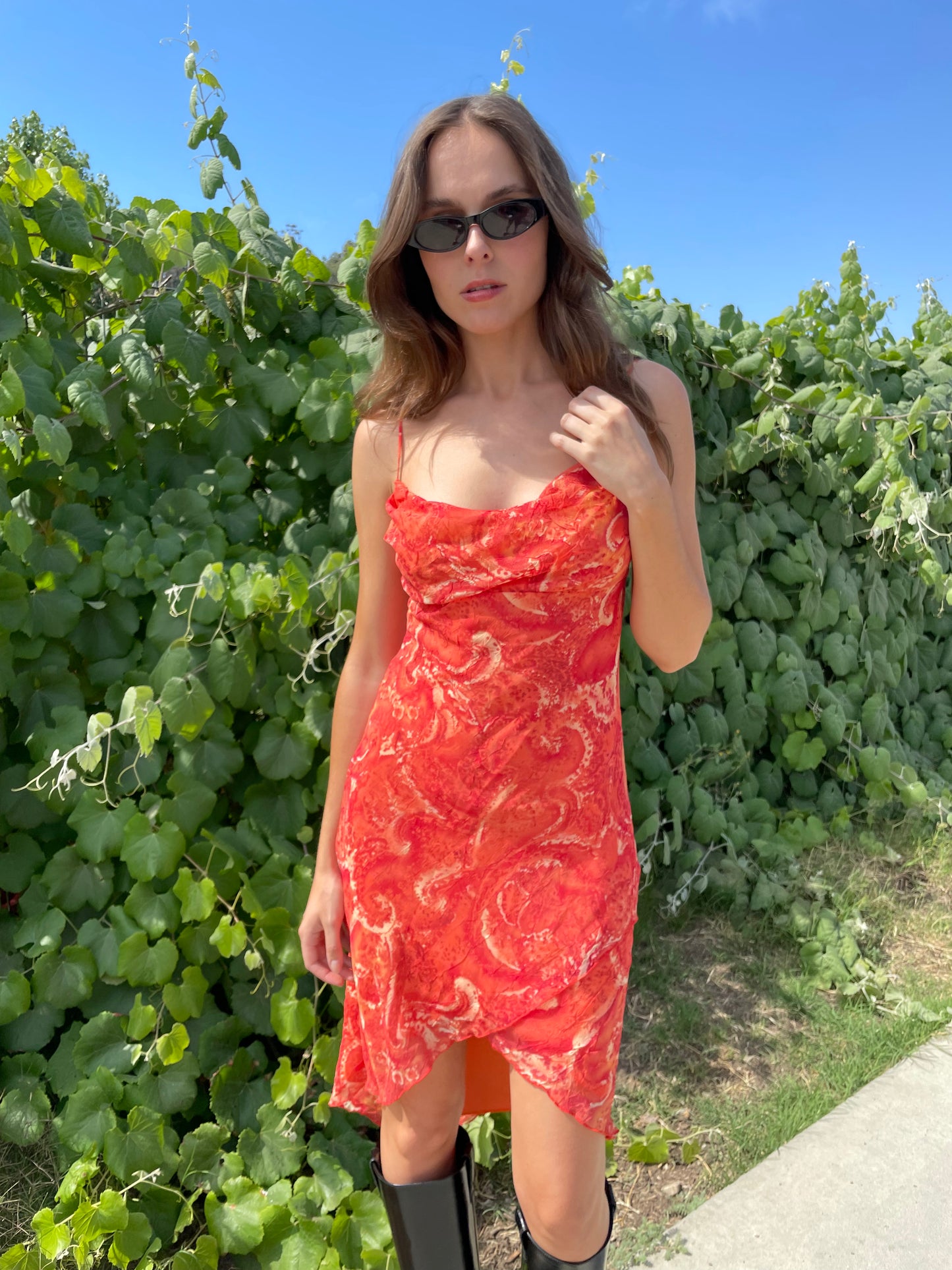 girl in orange printed dress