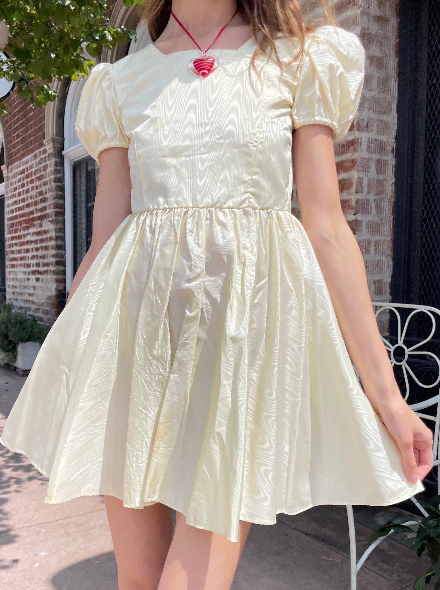 girl wearing yellow short dress