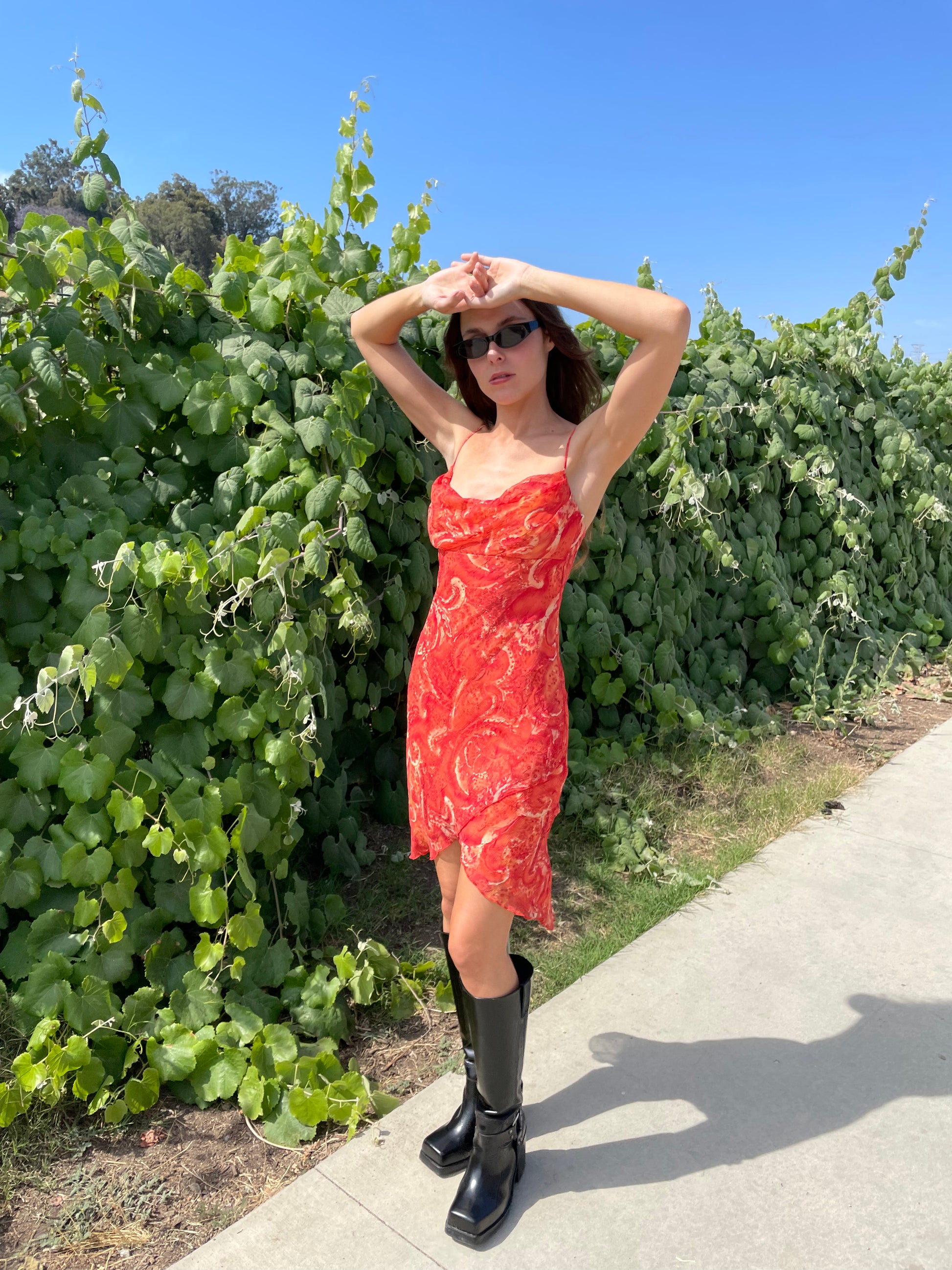 girl in orange printed dress