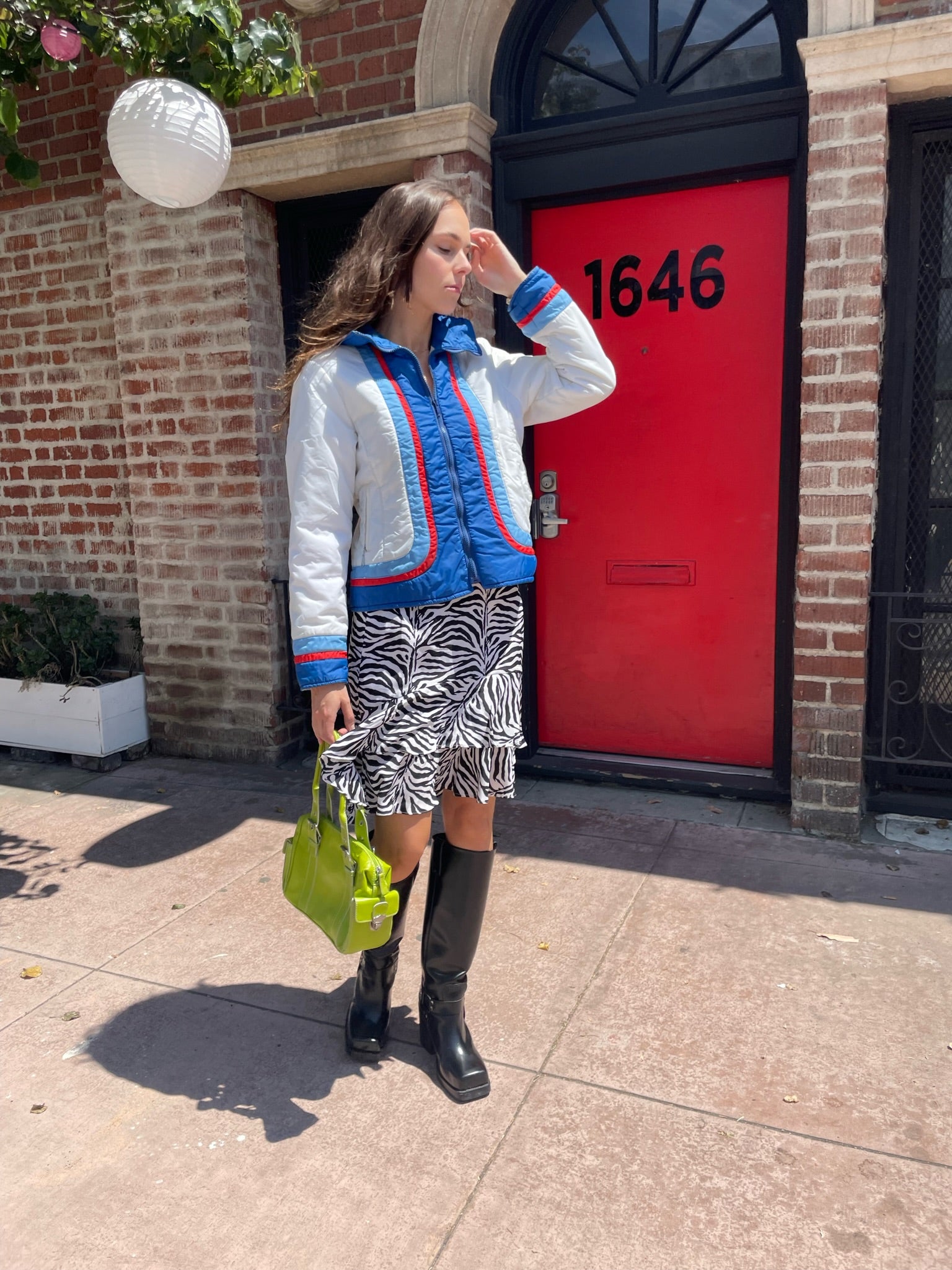 girl in zebra print skirt and sport jacket