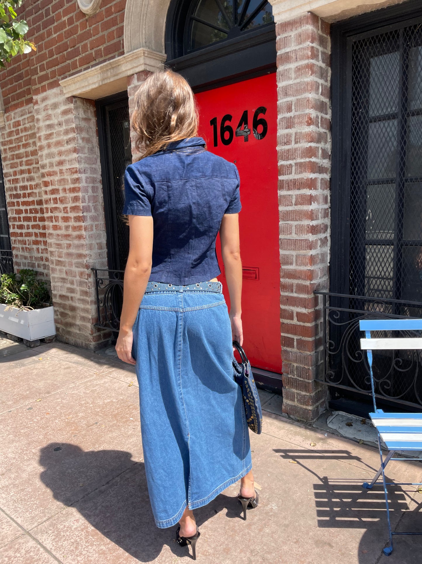 girl in short sleeve denim top