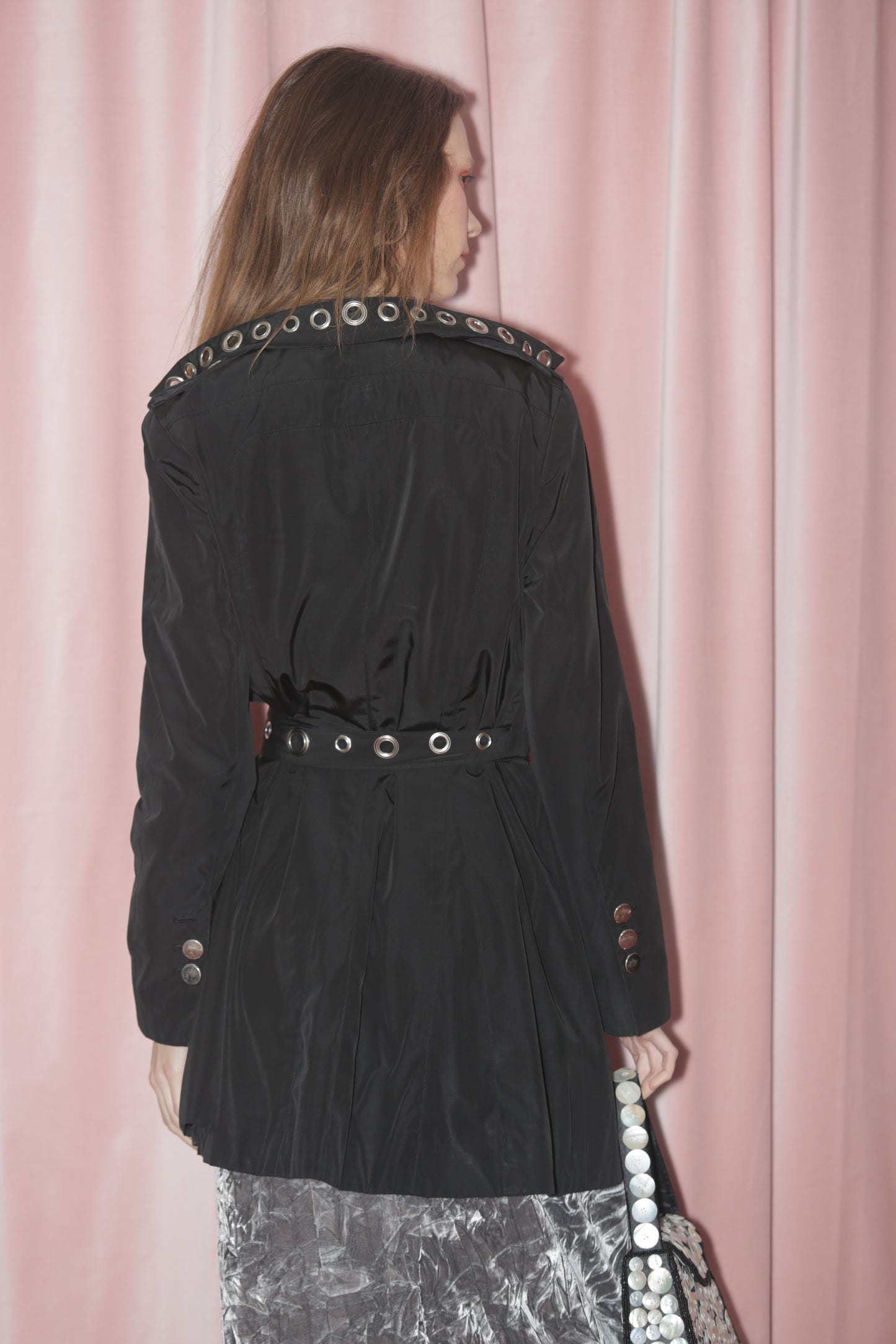 girl in black trenchcoat