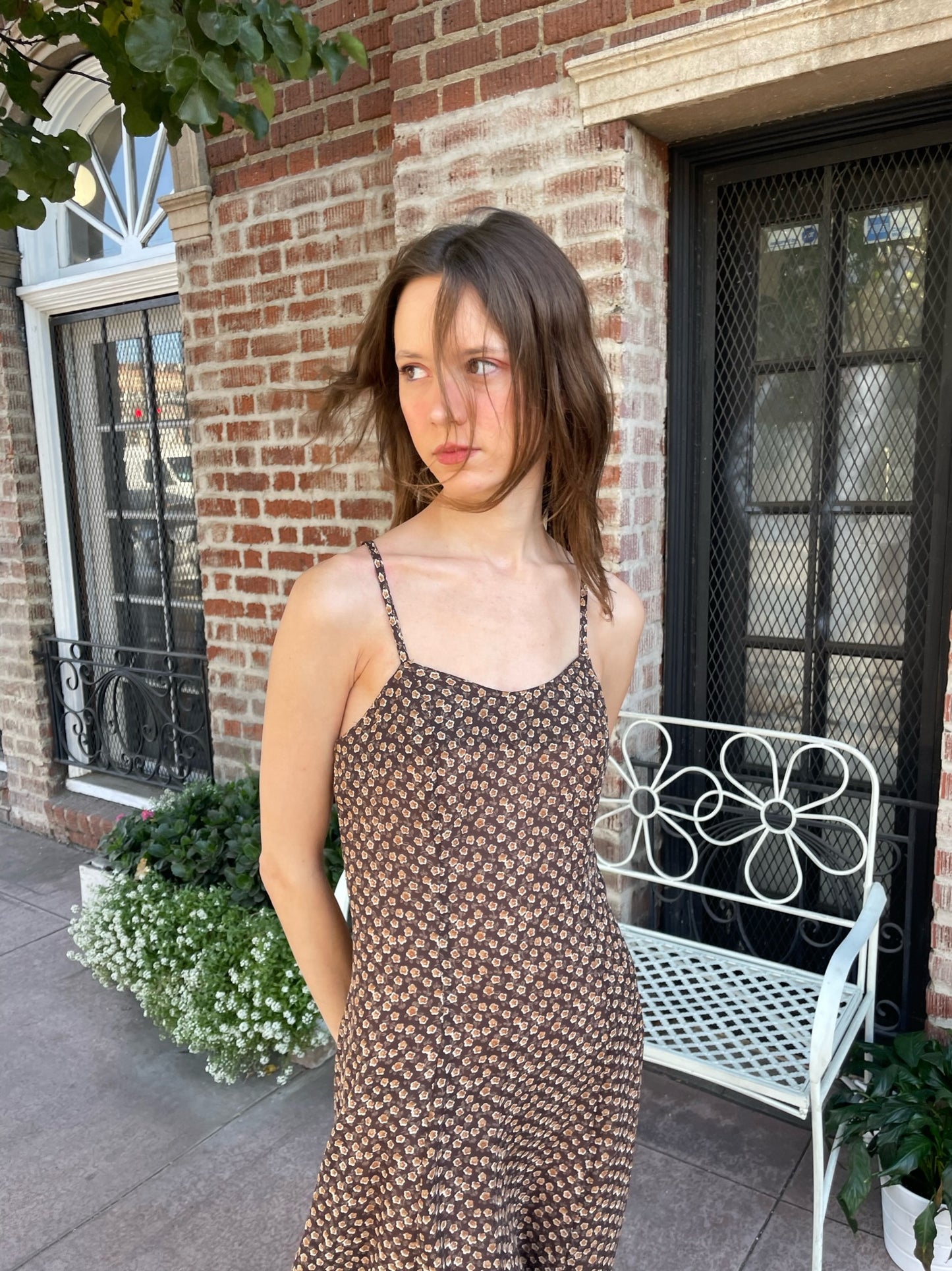 girl wearing brown dress