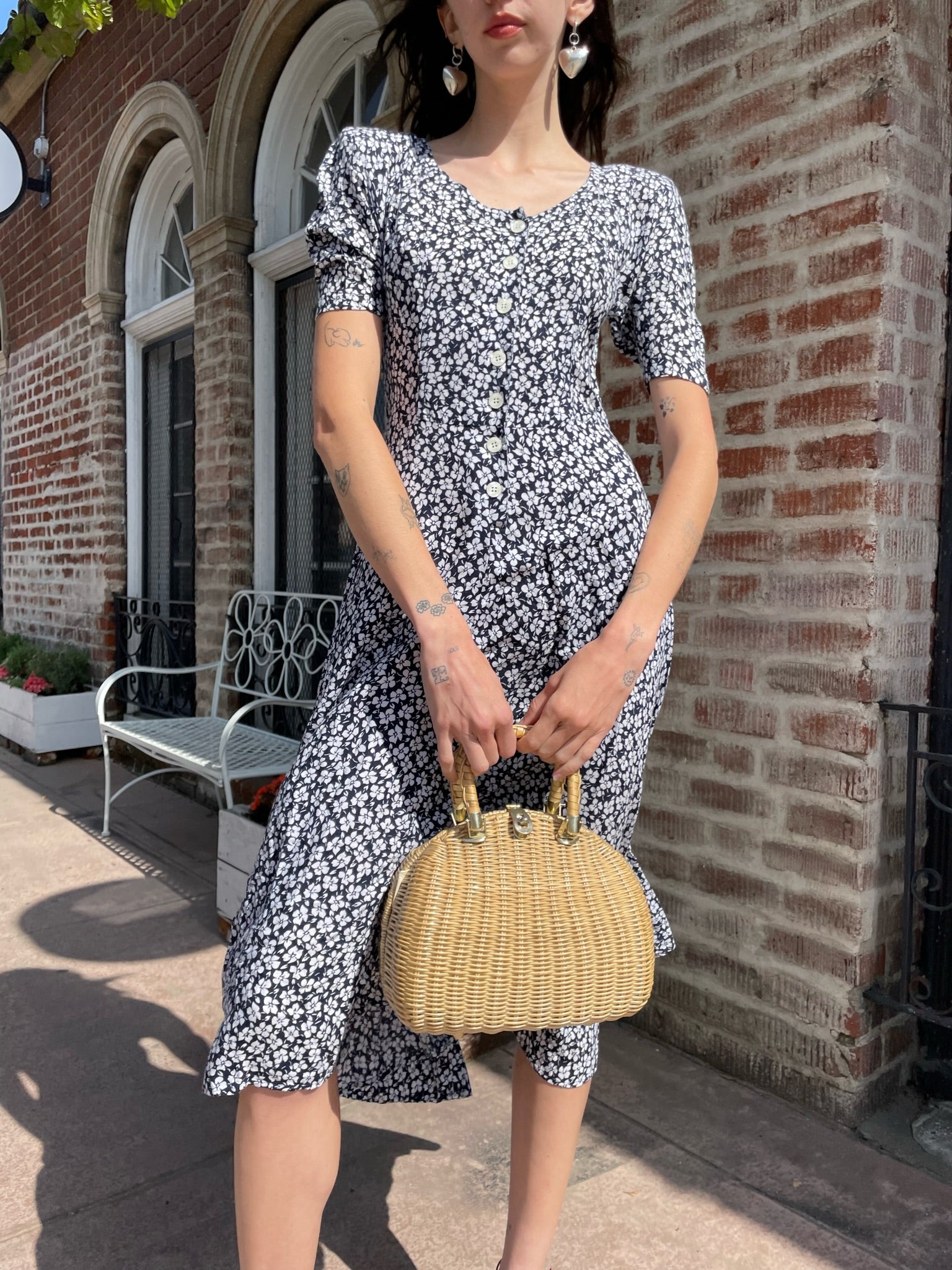 girl wearing black and white floral dress