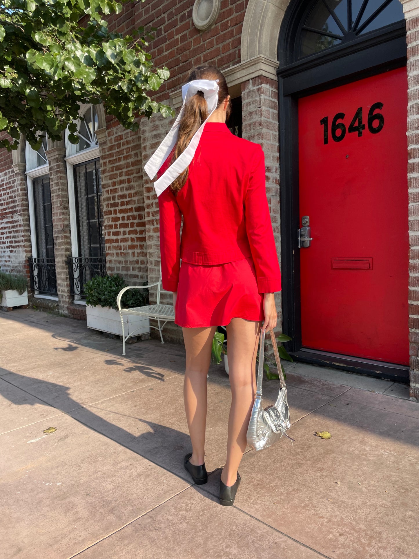 girl in red jacket and skirt