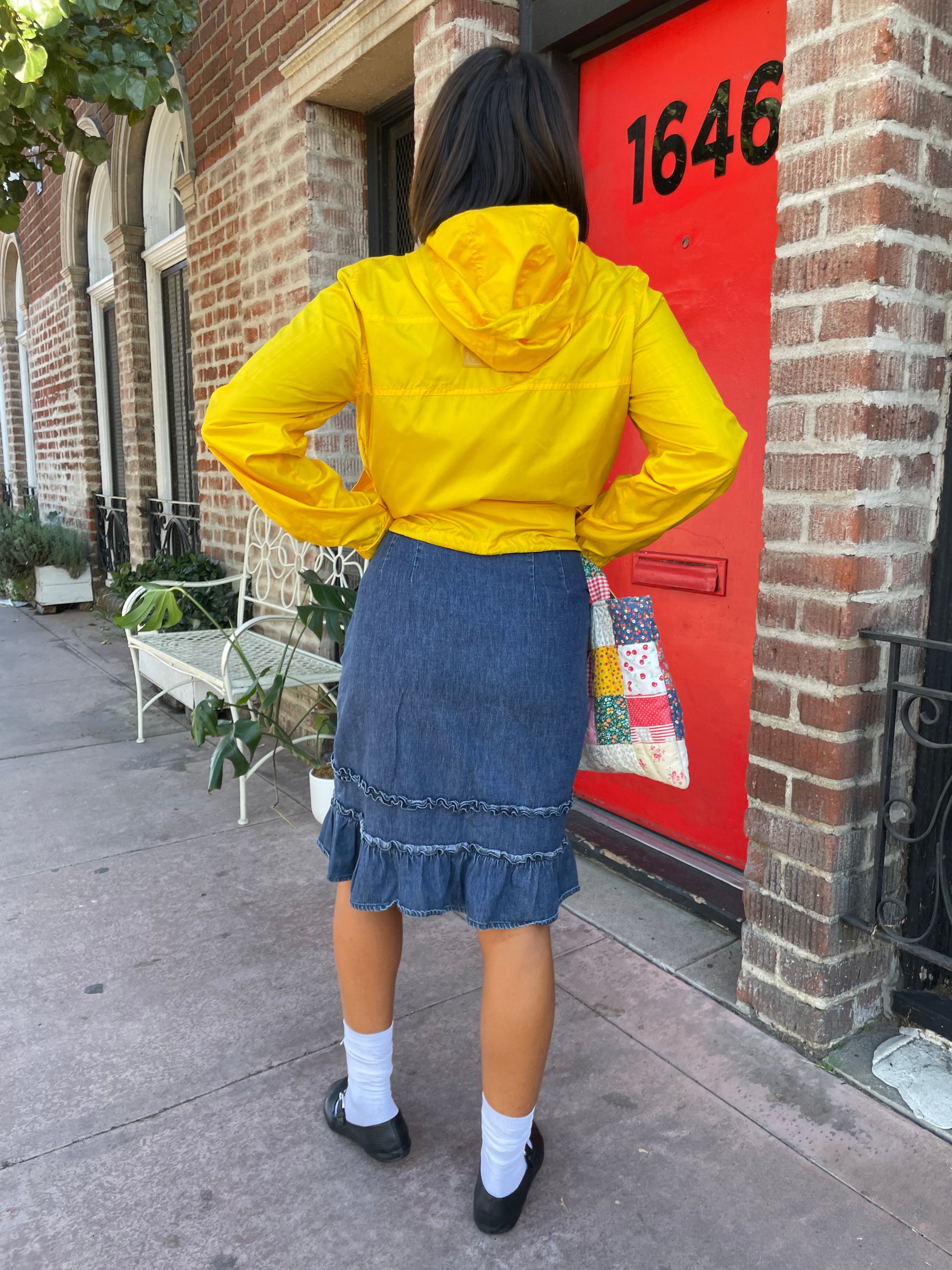 girl in denim ruffle skirt