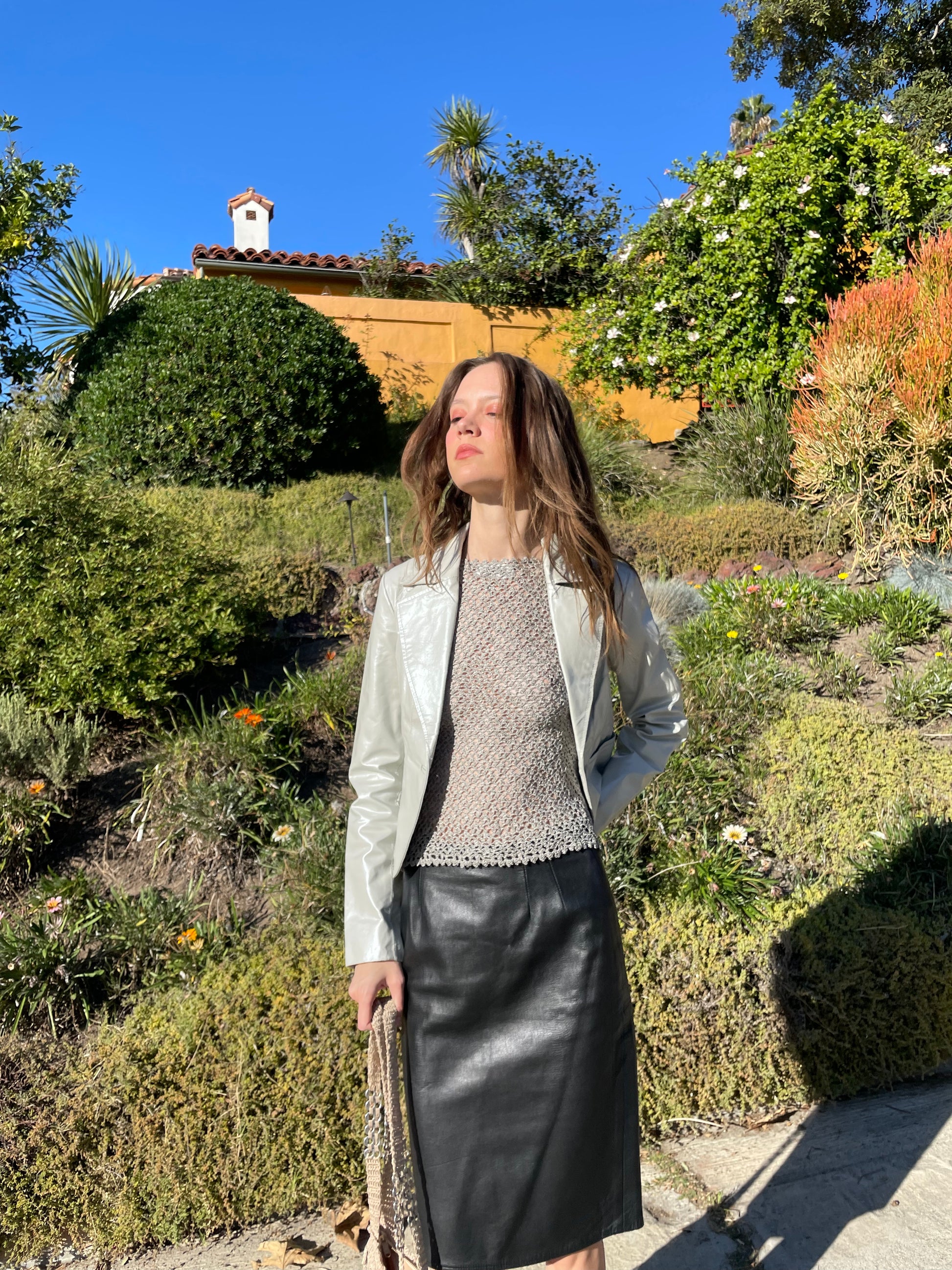 girl in silver leather jacket