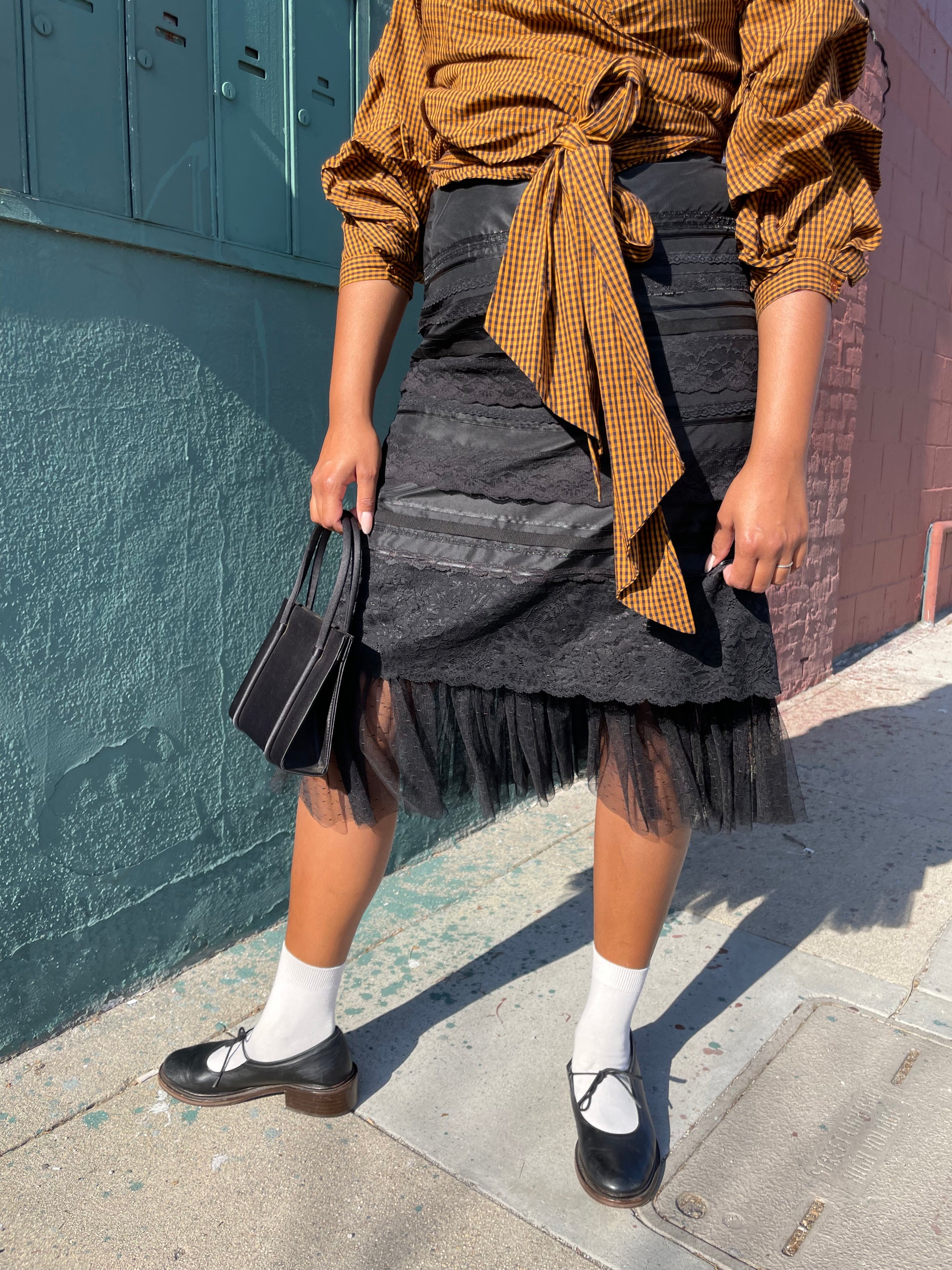 girl wearing Black Lace Tiered Skirt