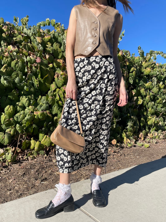 girl in black floral skirt