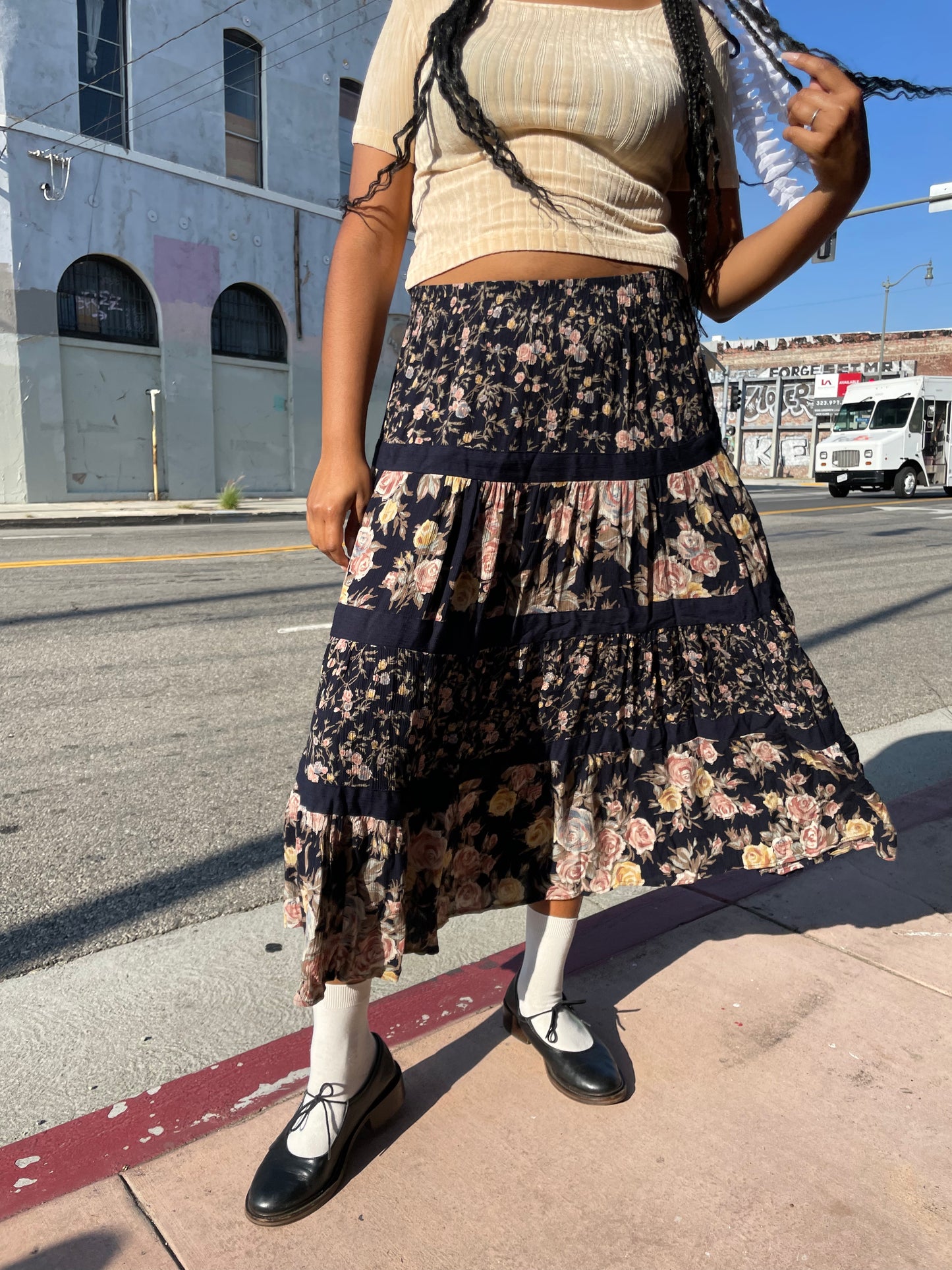 Girl wearing 90s Black Floral Print Skit 