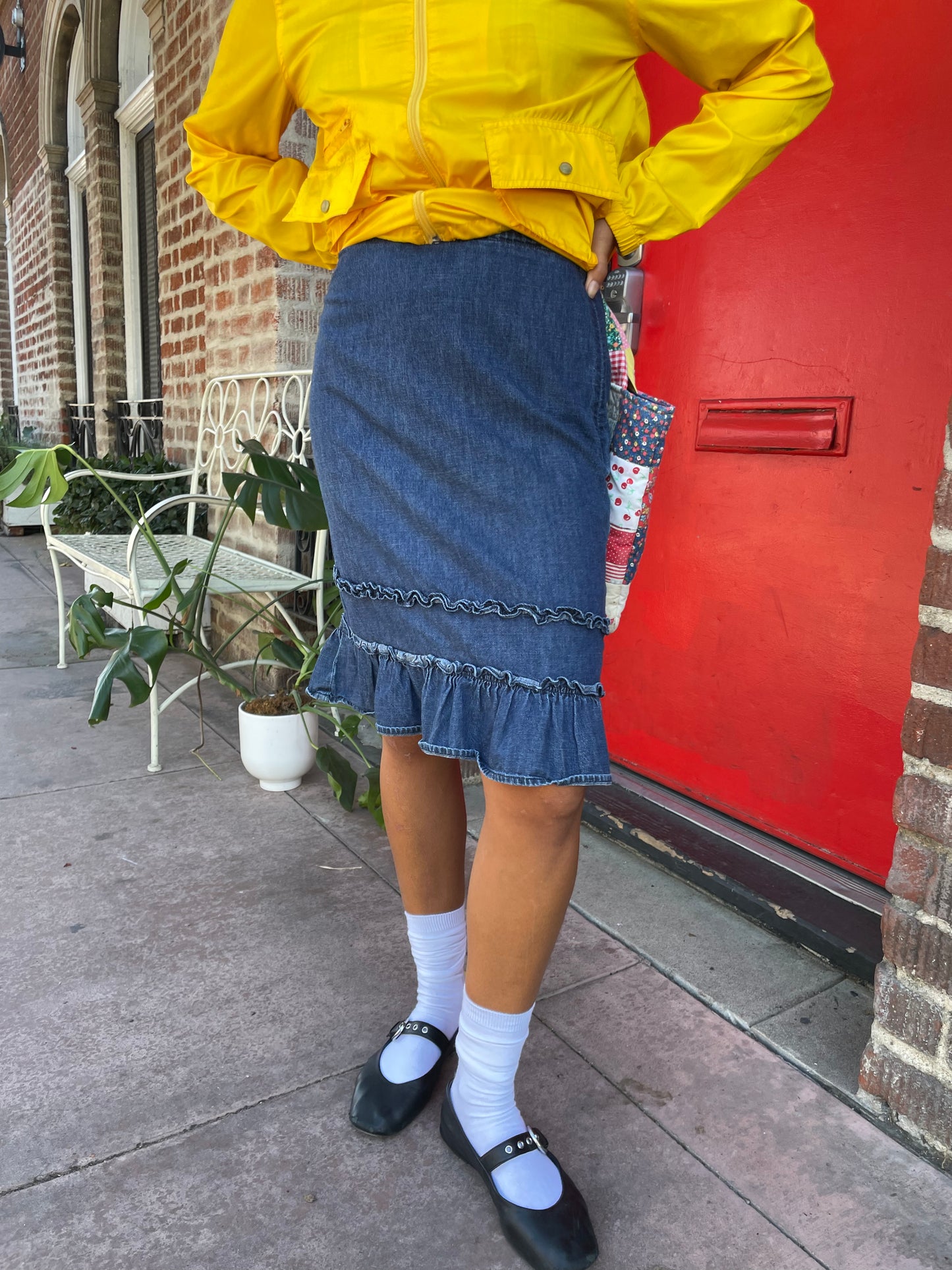 girl in denim ruffle skirt