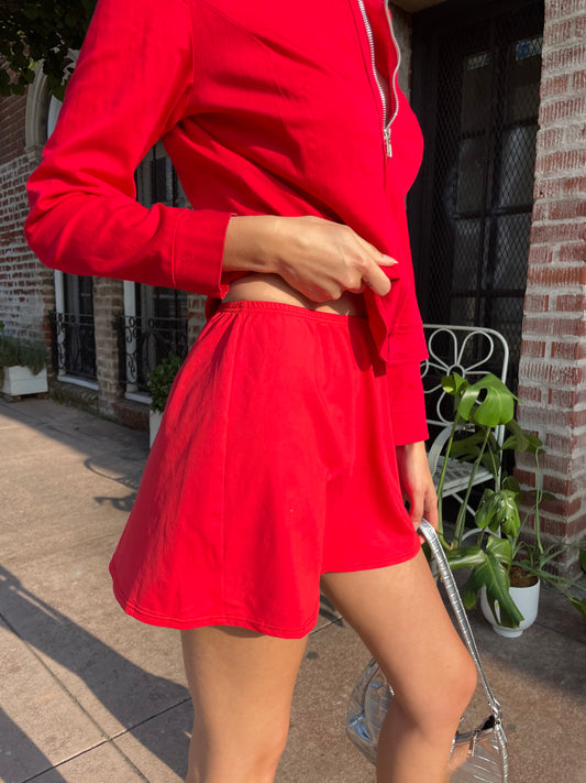 girl in red jacket and skirt