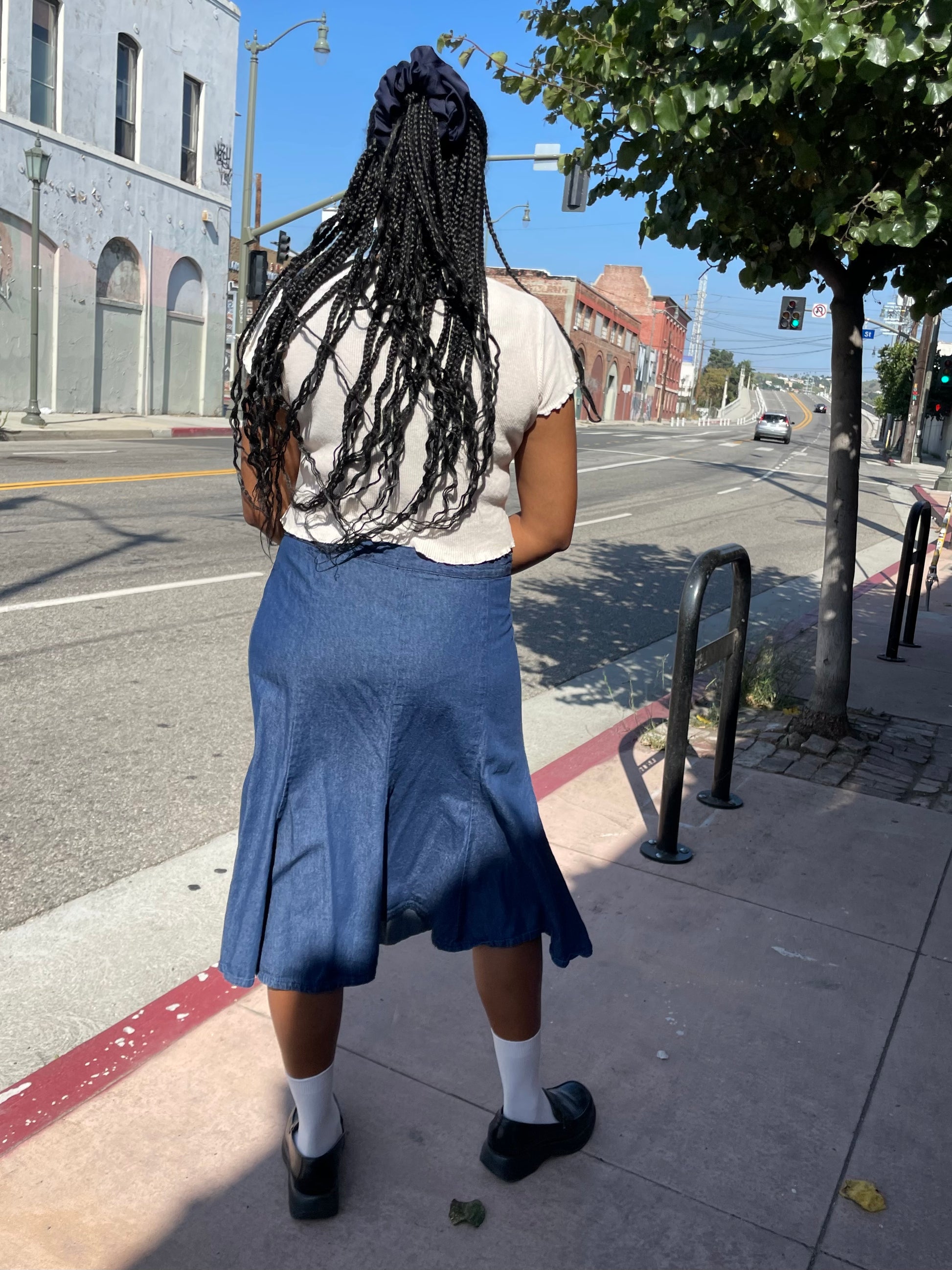 girl wearing denim skirt