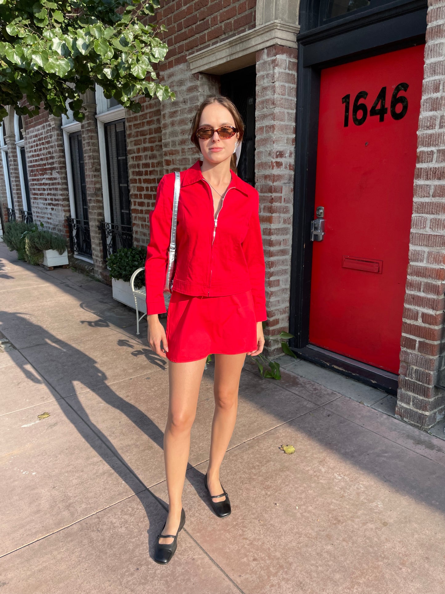 girl in red jacket and skirt