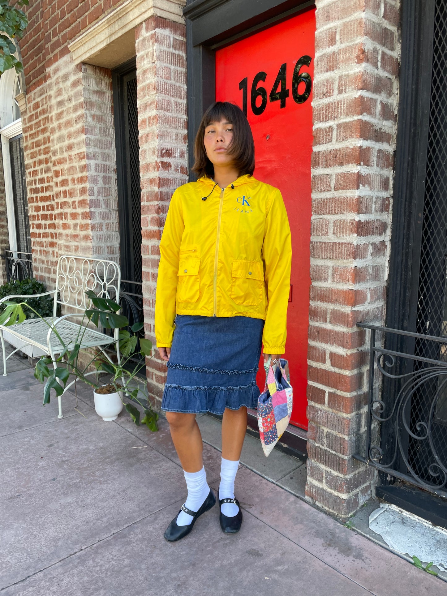 girl in denim ruffle skirt