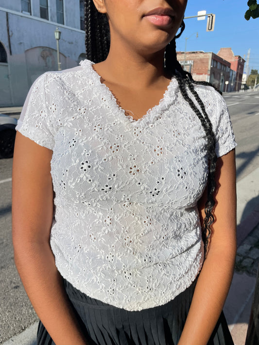 Girl wearing White Ruffle V Neck Top