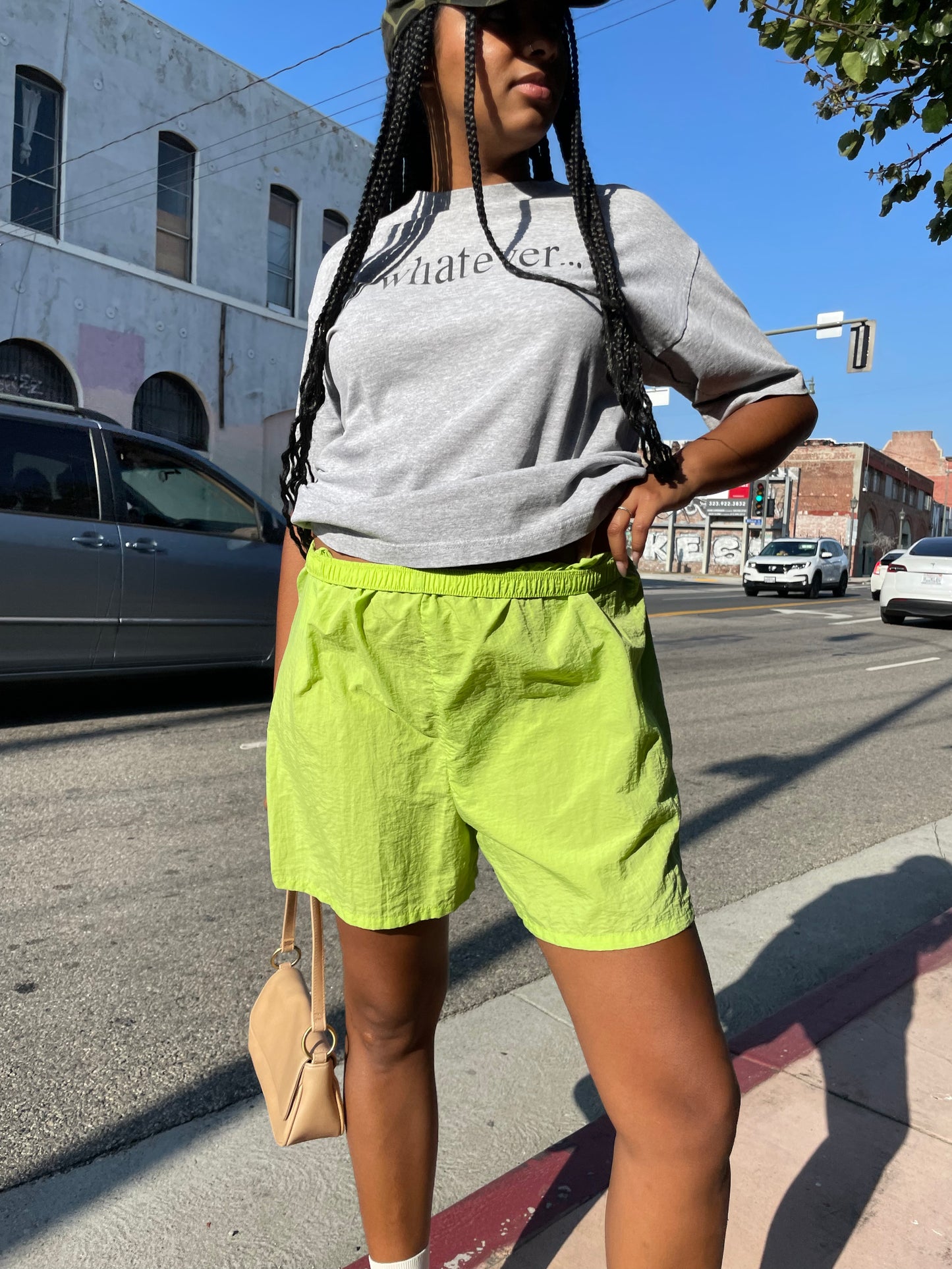 Girl wearing lime green runner shorts