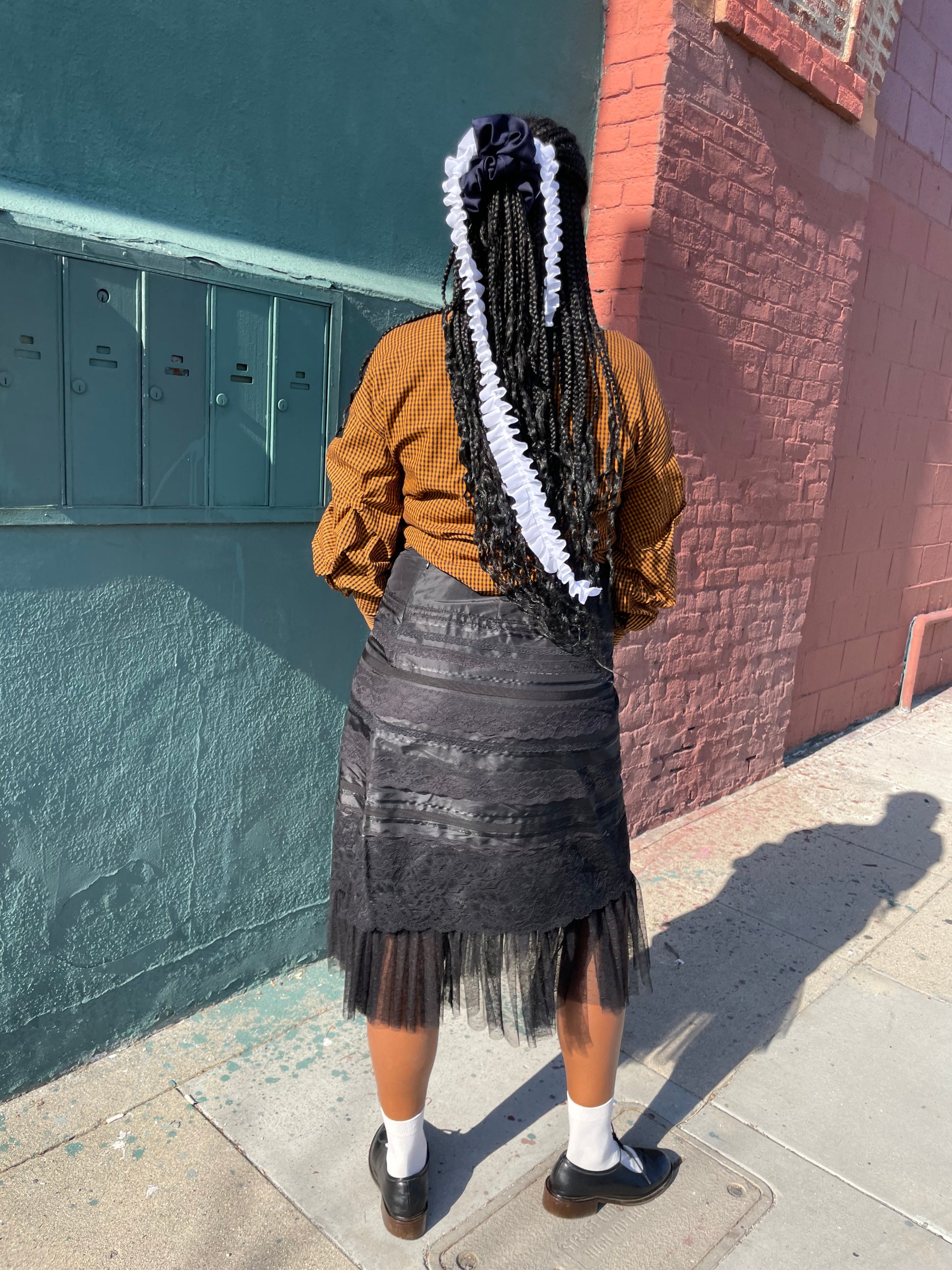 girl wearing Black Lace Tiered Skirt