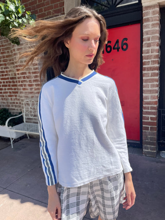 girl in white long sleeve top