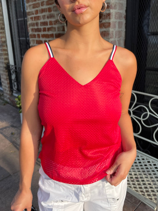 girl in red sporty mesh tank